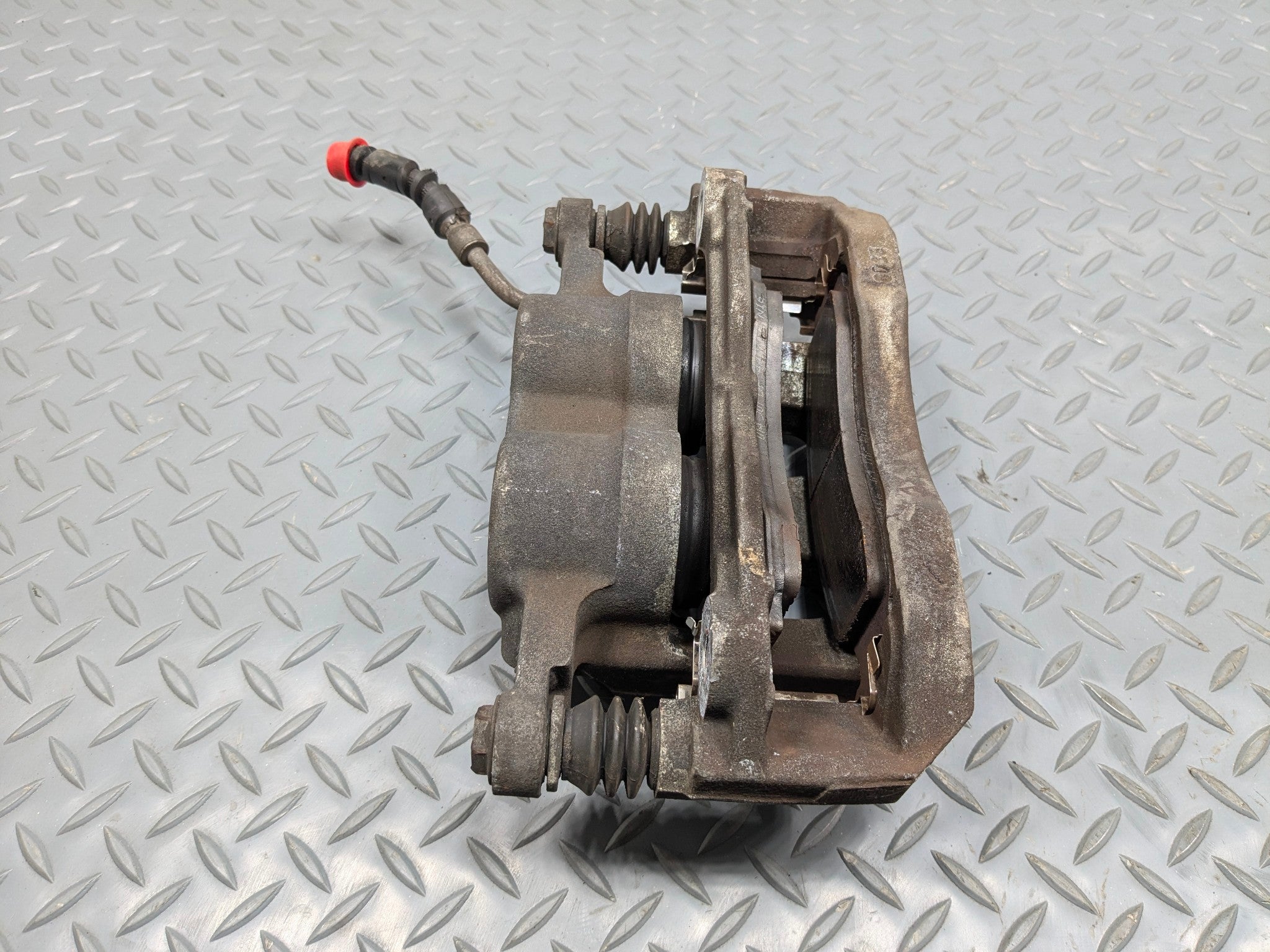 2006 - 2010 OEM FORD EXPLORER FRONT LEFT DRIVER SIDE BRAKE CALIPER ASSEMBLY