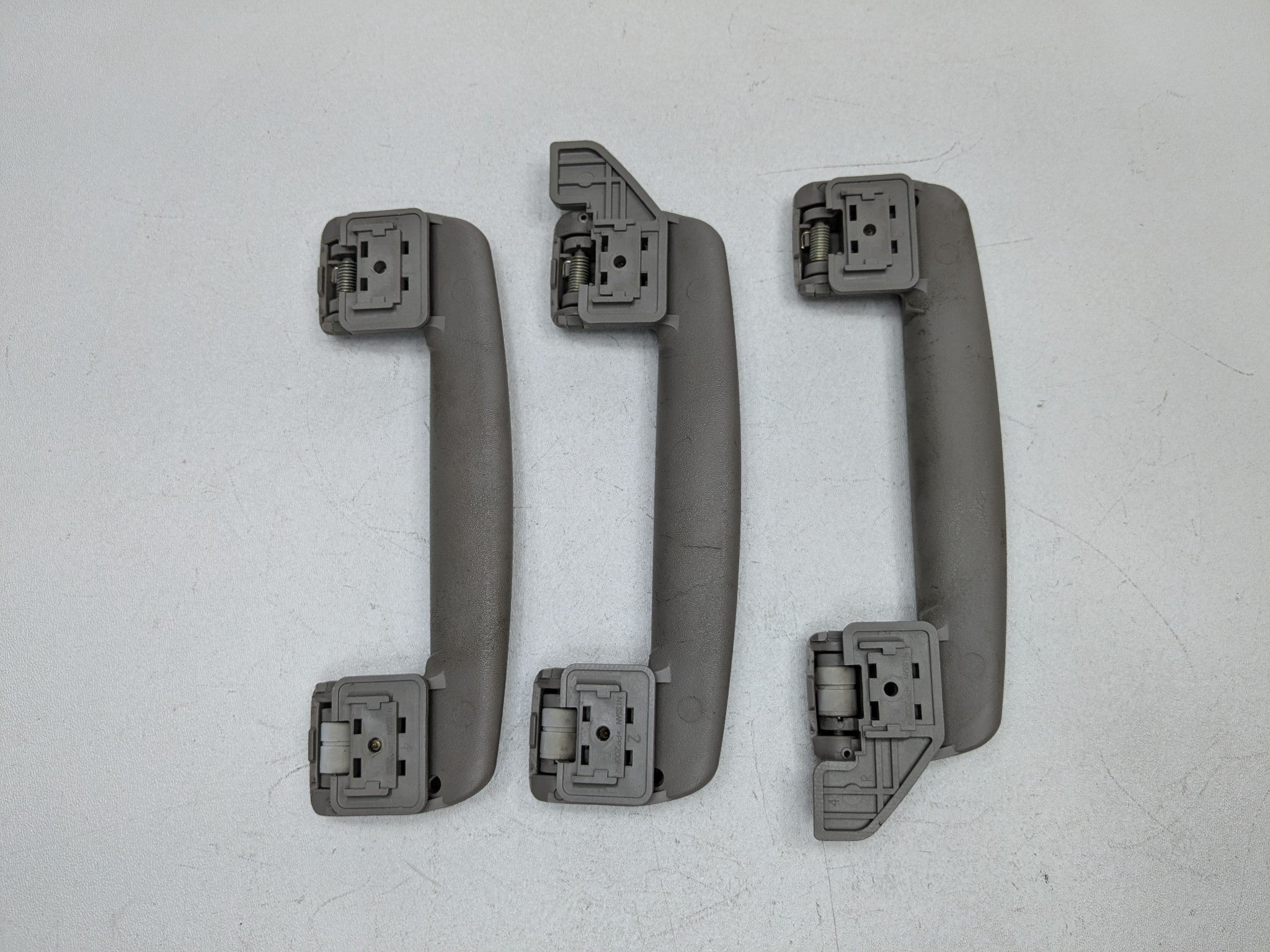 04 - 06 OEM NISSAN MAXIMA FRONT AND REAR INTERIOR OVERHEAD GRAB BAR HANDLE SET