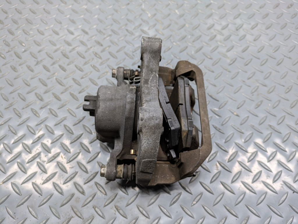 2004 - 2006 OEM NISSAN MAXIMA FRONT LEFT DRIVER SIDE BRAKE CALIPER ASSEMBLY
