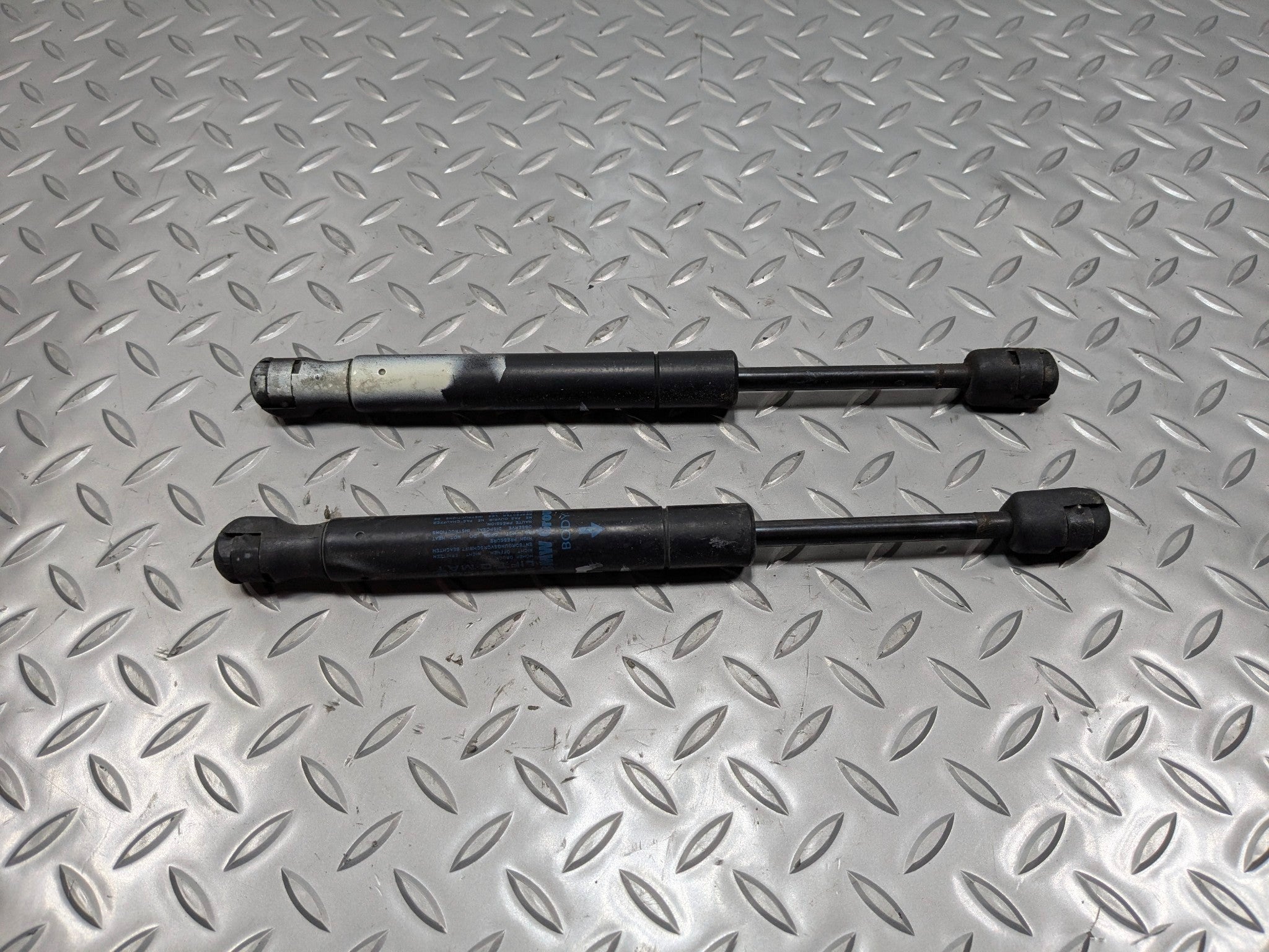 09 - 10 OEM MINI COOPER CONVERTIBLE FRONT LEFT AND RIGHT SIDE HOOD SHOCK STRUT