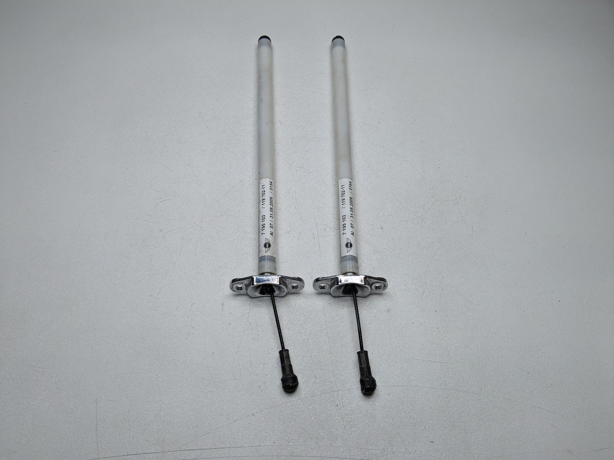 2009 - 2010 OEM MINI COOPER CONVERTIBLE REAR TRUNK LID SUPPORT RETRACTOR SET