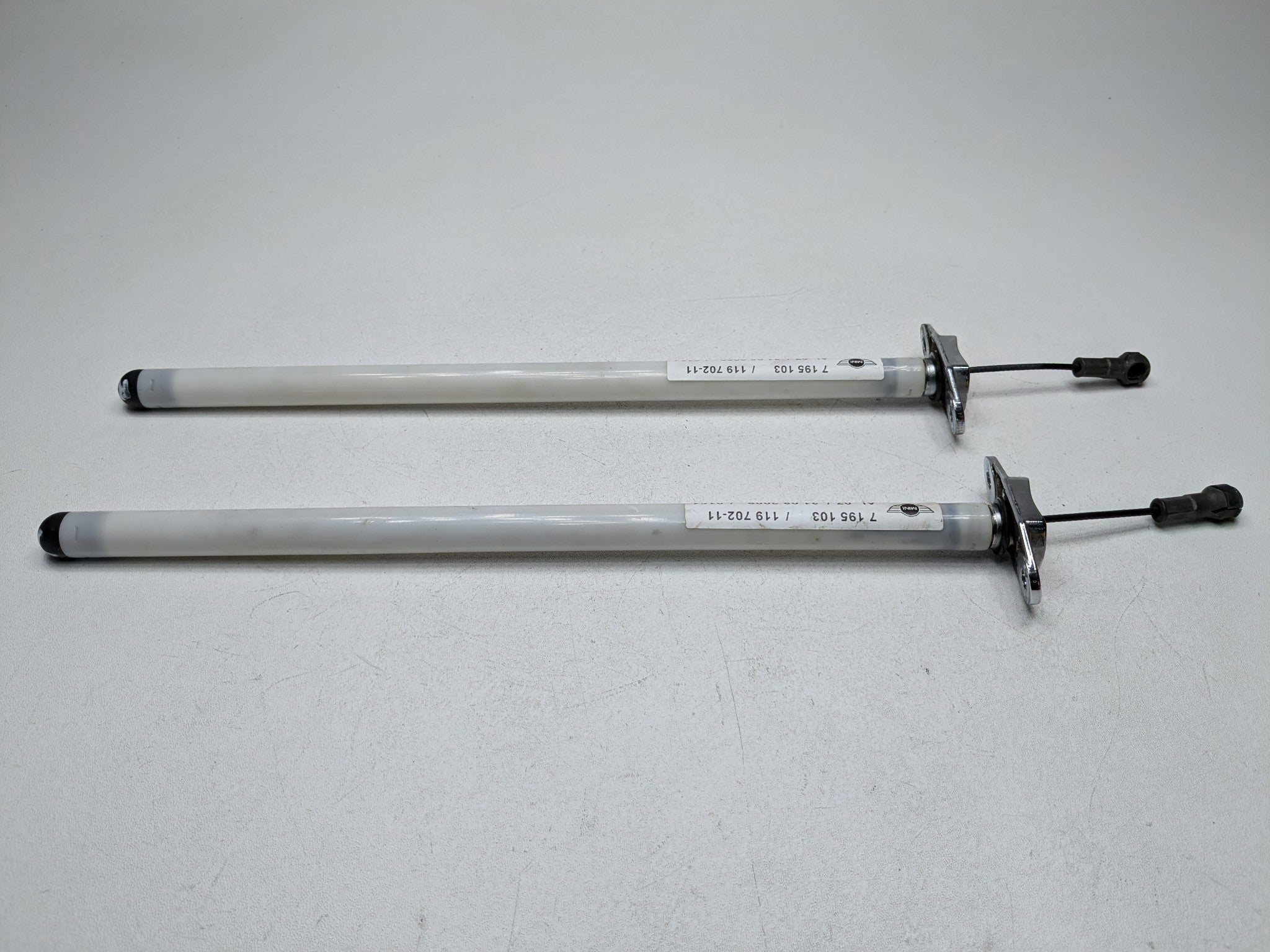 2009 - 2010 OEM MINI COOPER CONVERTIBLE REAR TRUNK LID SUPPORT RETRACTOR SET