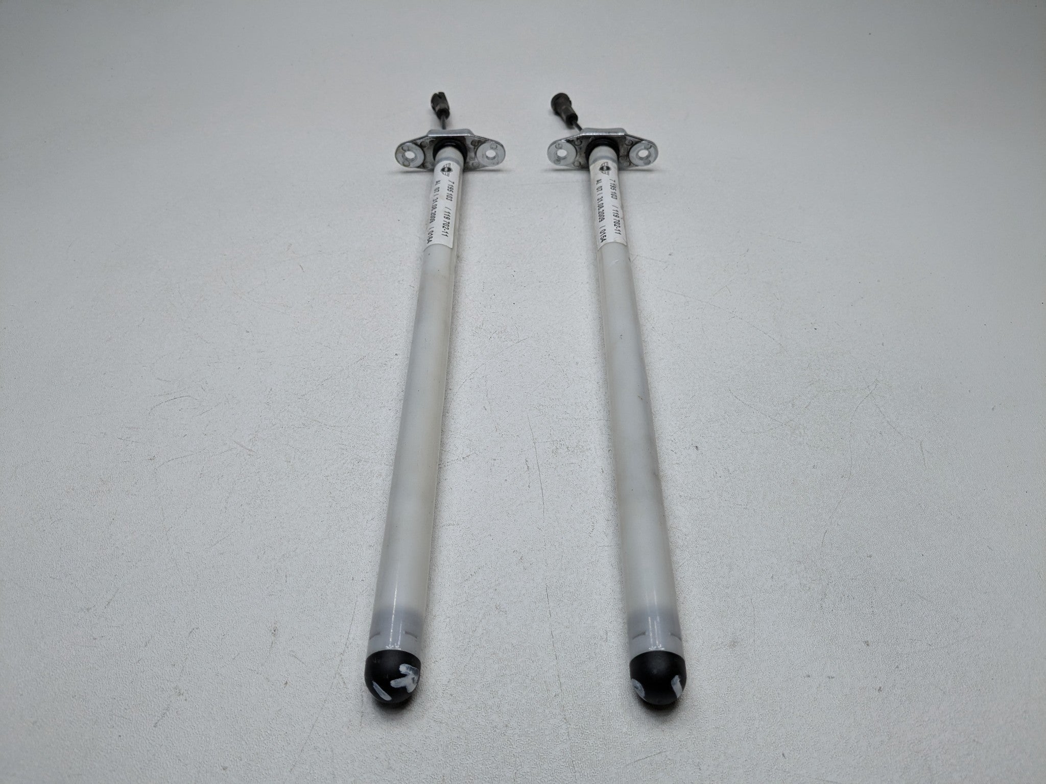 2009 - 2010 OEM MINI COOPER CONVERTIBLE REAR TRUNK LID SUPPORT RETRACTOR SET