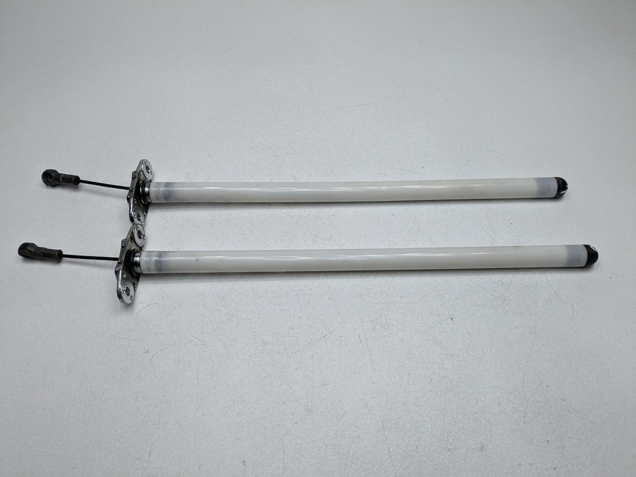 2009 - 2010 OEM MINI COOPER CONVERTIBLE REAR TRUNK LID SUPPORT RETRACTOR SET