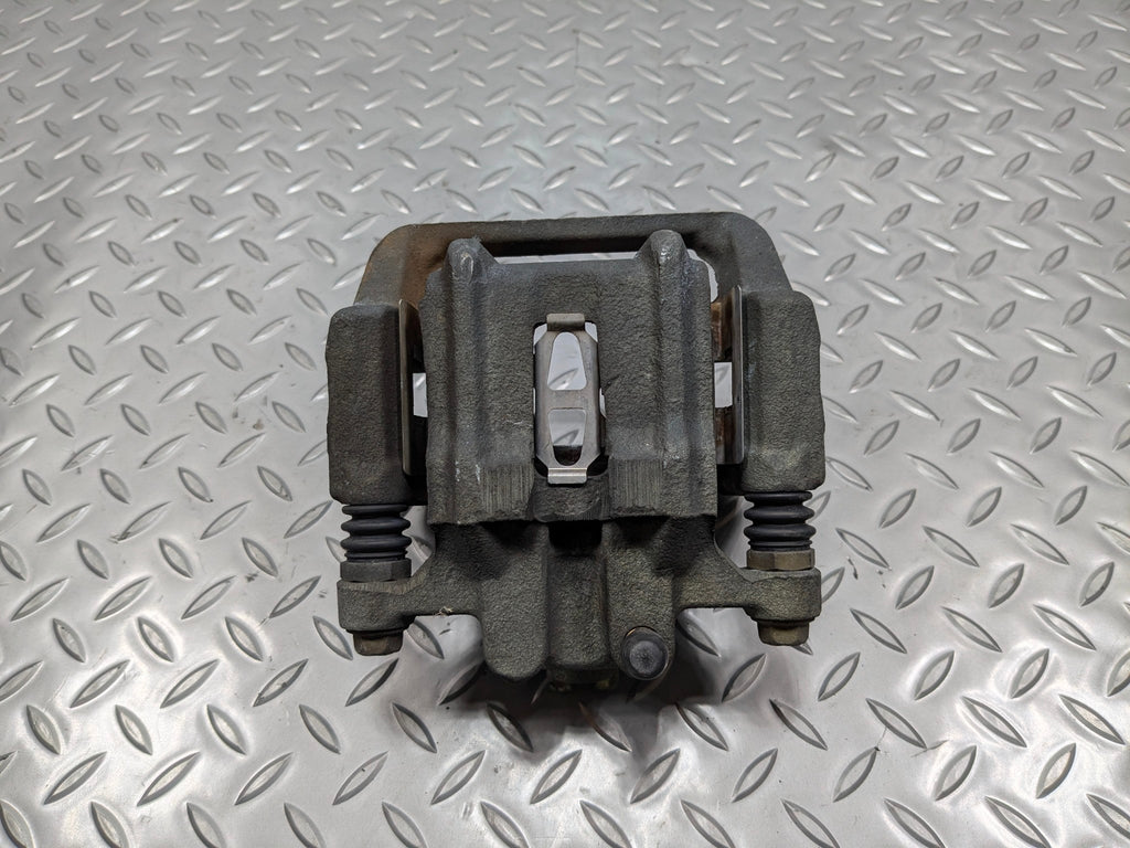 2004 - 2006 OEM ACURA TL REAR LEFT DRIVER SIDE BRAKE CALIPER ASSEMBLY