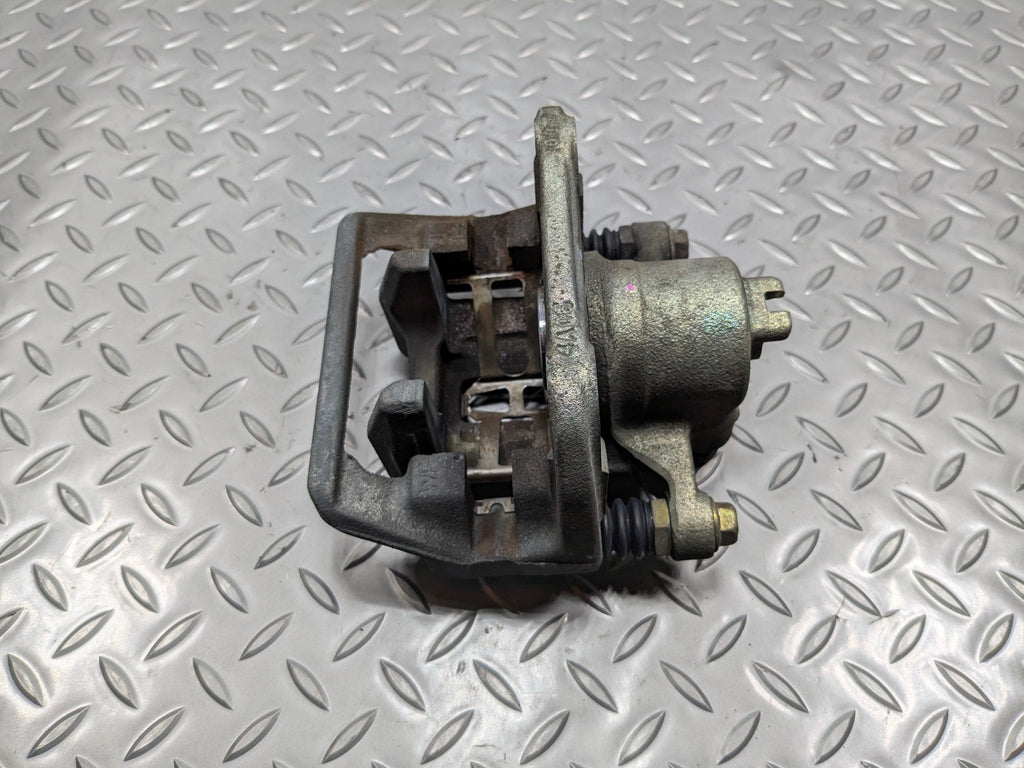 2004 - 2006 OEM ACURA TL REAR LEFT DRIVER SIDE BRAKE CALIPER ASSEMBLY