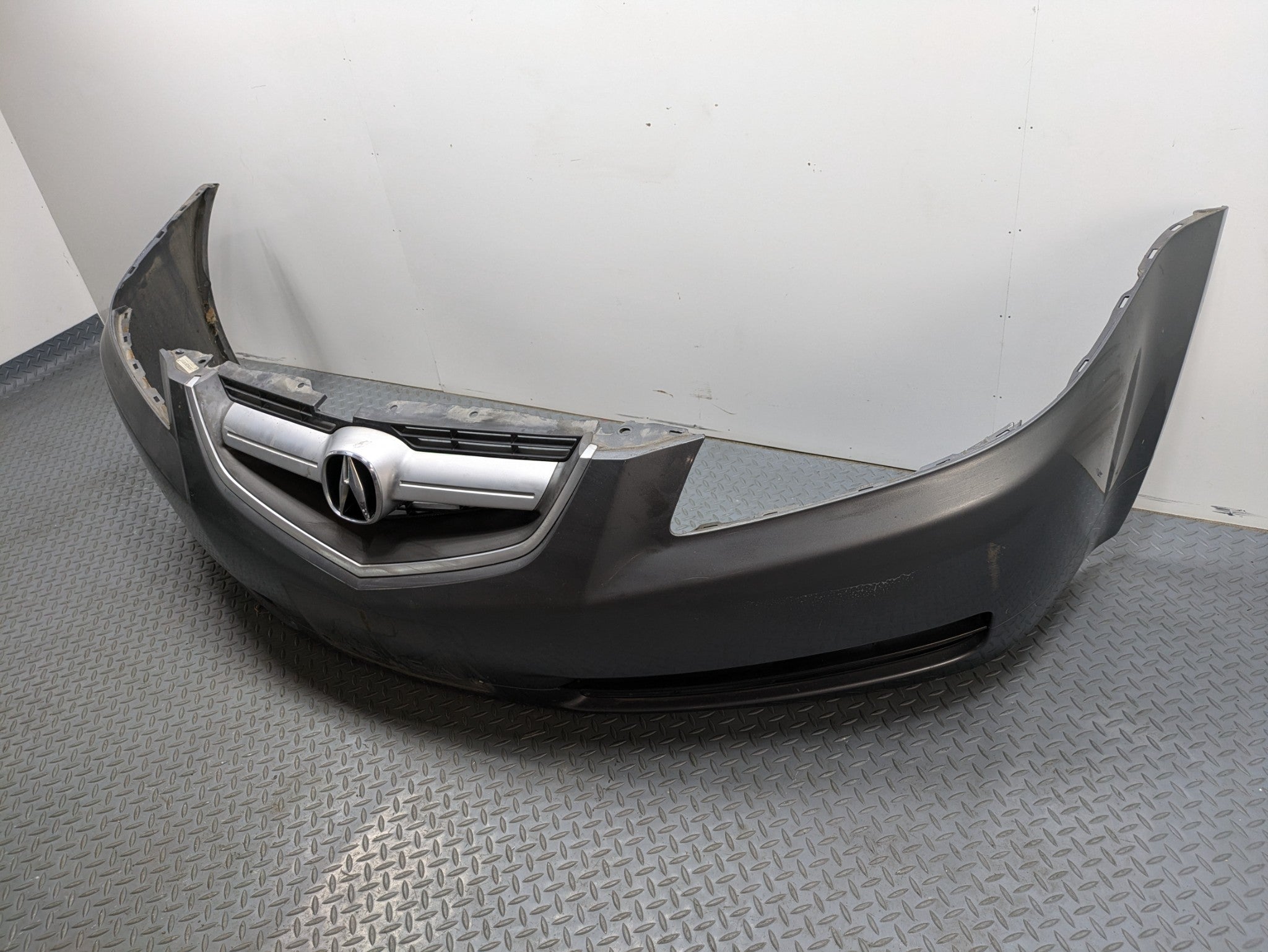 2004 - 2006 OEM ACURA TL FRONT BUMPER COVER PANEL WITH EMBLEM ASSEMBLY