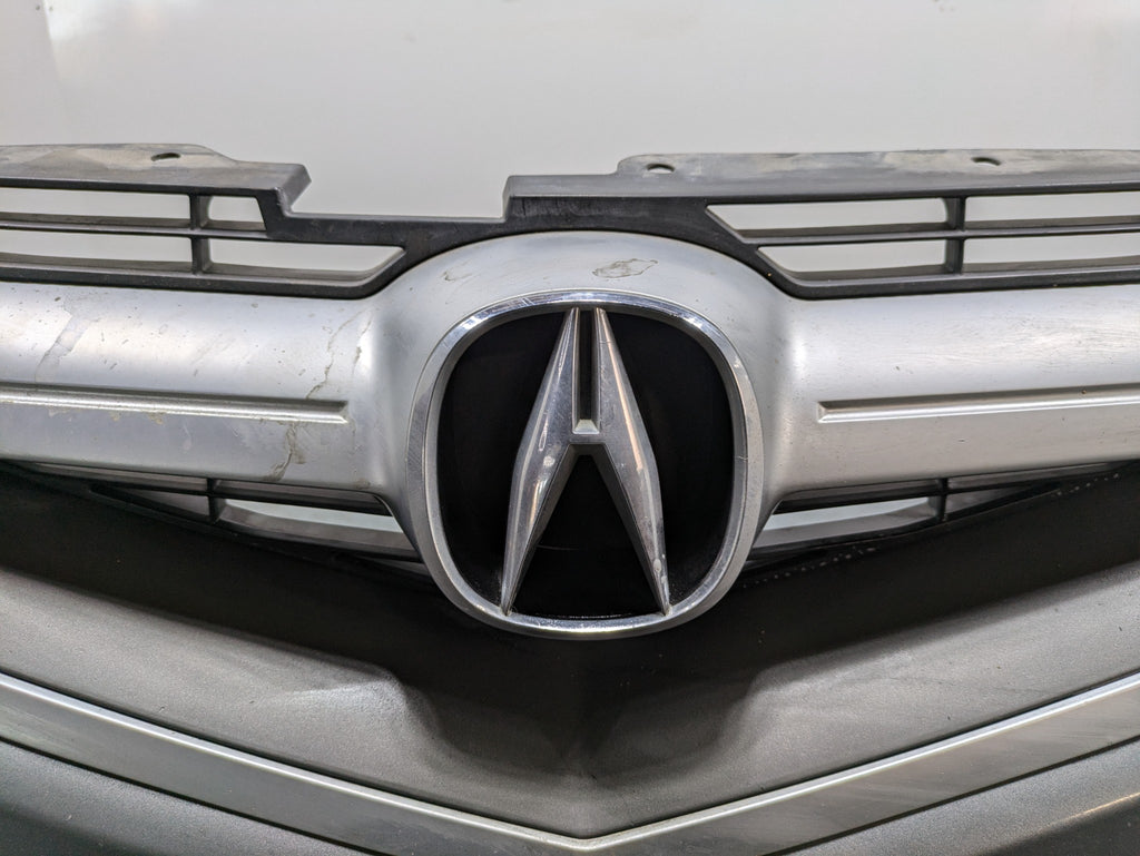 2004 - 2006 OEM ACURA TL FRONT BUMPER COVER PANEL WITH EMBLEM ASSEMBLY