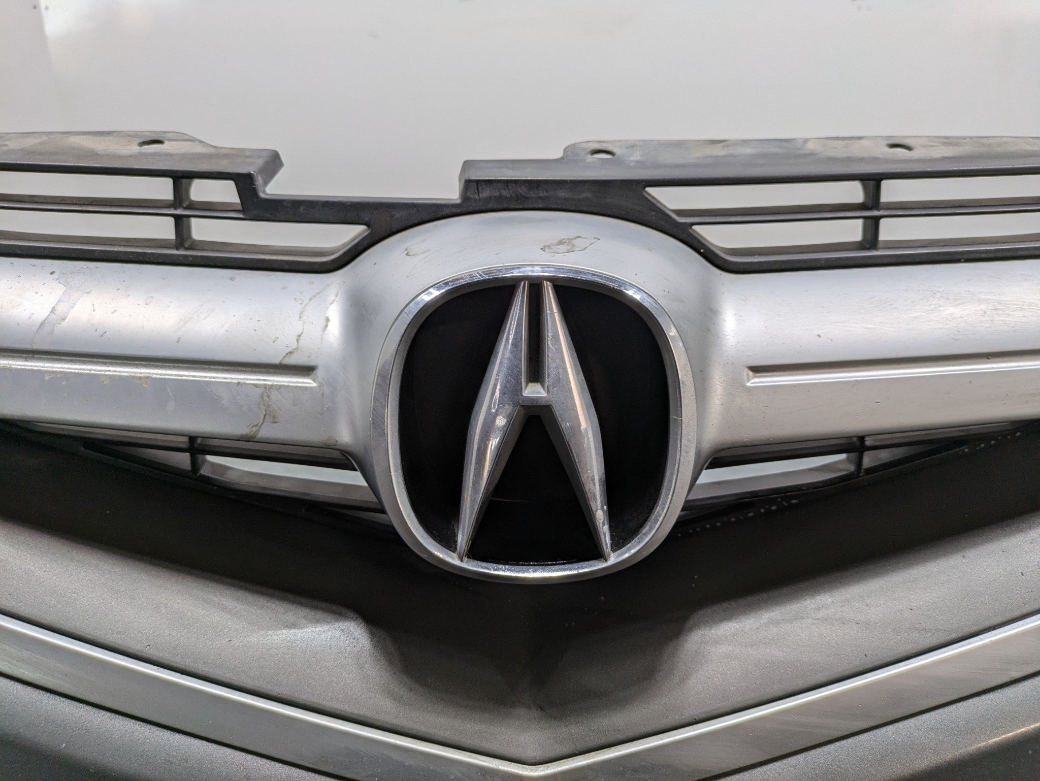 2004 - 2006 OEM ACURA TL FRONT BUMPER COVER PANEL WITH EMBLEM ASSEMBLY