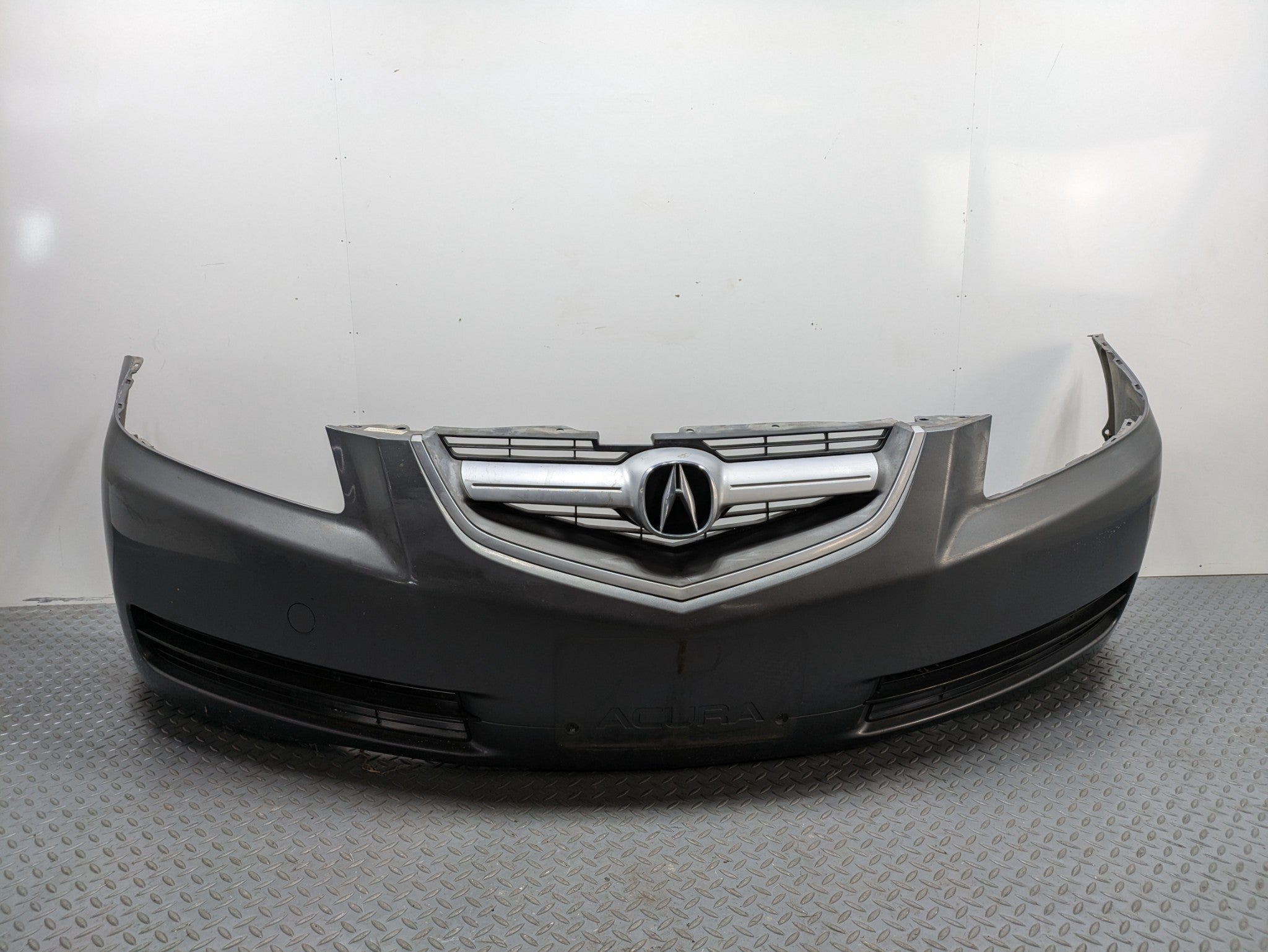 2004 - 2006 OEM ACURA TL FRONT BUMPER COVER PANEL WITH EMBLEM ASSEMBLY