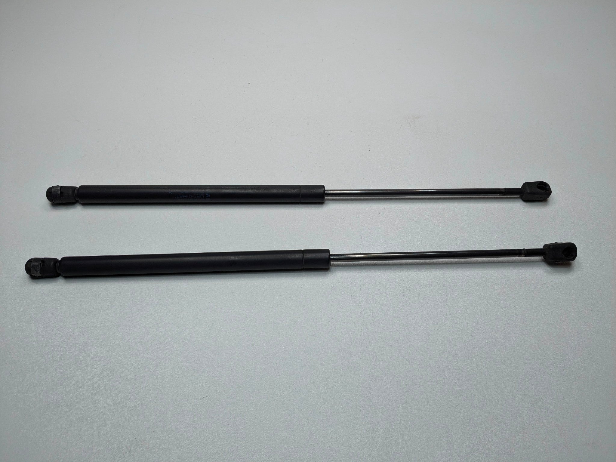 2002 - 2004 OEM MINI COOPER LEFT AND RIGHT HOOD SHOCK STRUTS LIFT SUPPORT SET