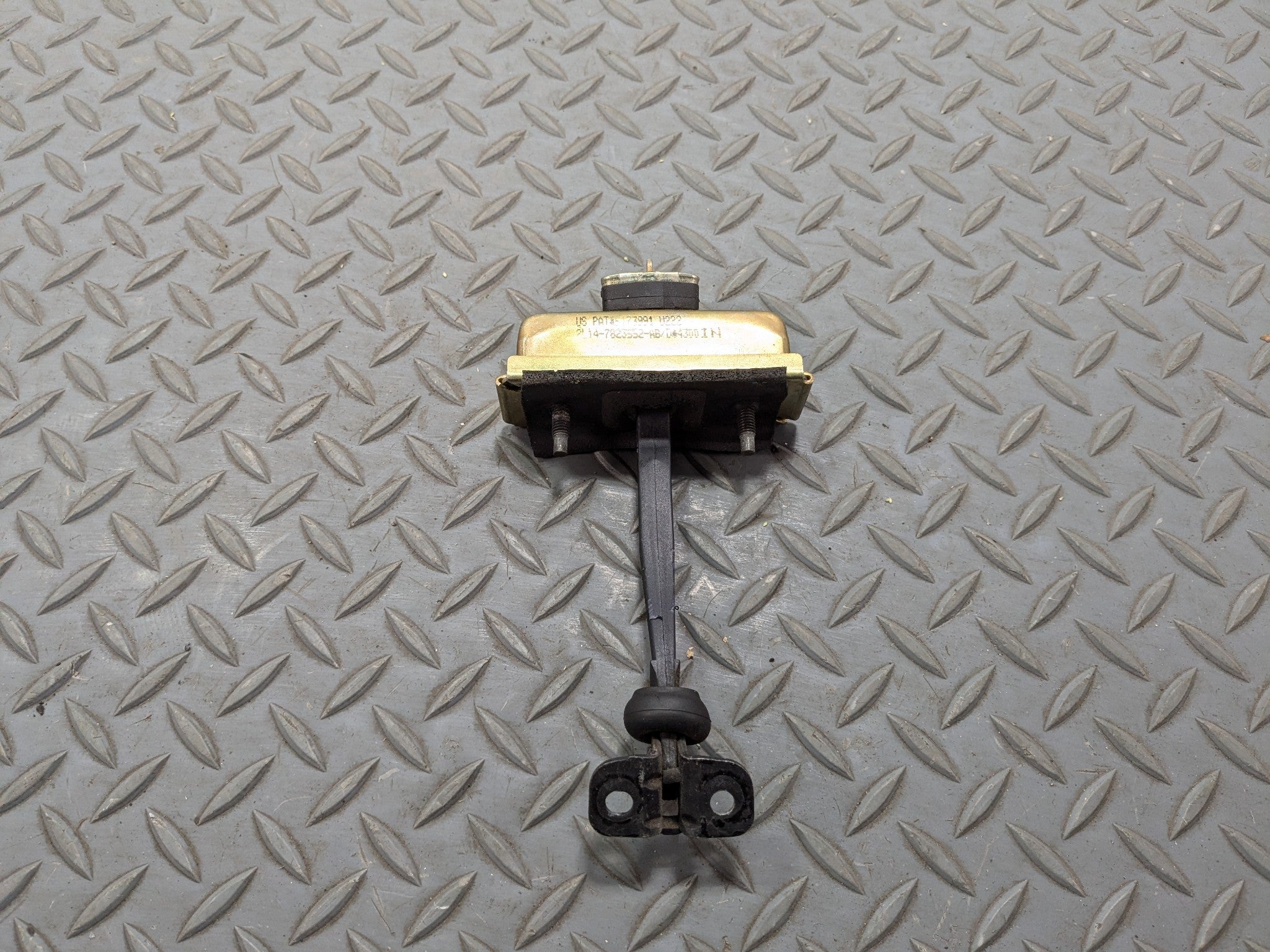03 - 06 OEM LINCOLN NAVIGATOR FRONT LEFT DRIVER SIDE DOOR CHECK STRAP STOPPER