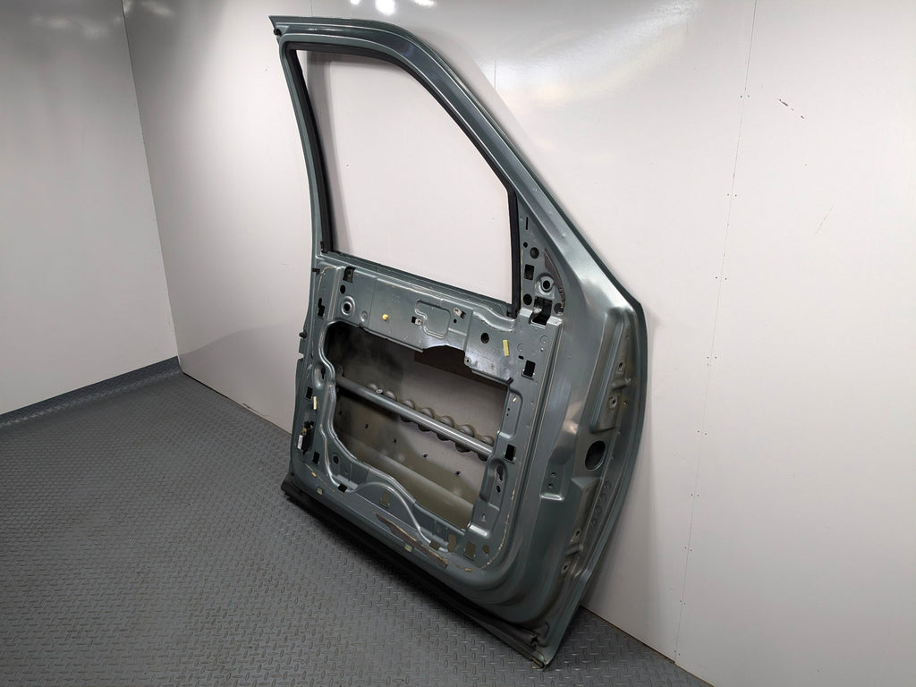 03 - 06 OEM LINCOLN NAVIGATOR FRONT LEFT DRIVER SIDE DOOR SHELL PANEL STROM DUST