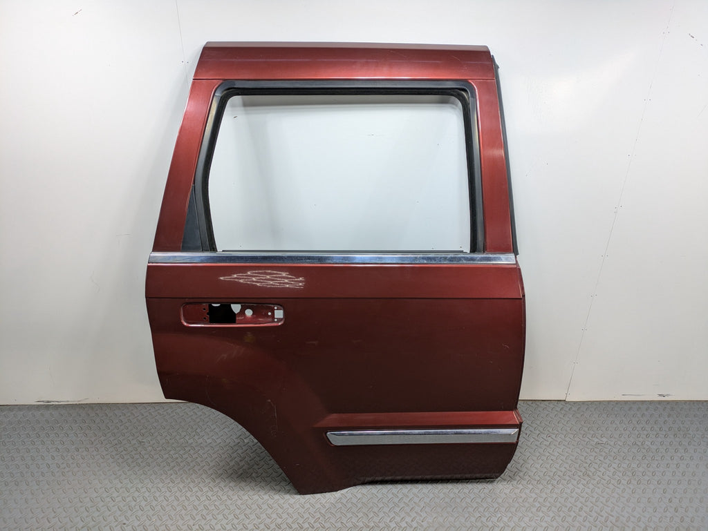 05 - 07 OEM JEEP GRAND CHEROKEE REAR RIGHT SIDE DOOR SHELL PANEL CALIENTE RED