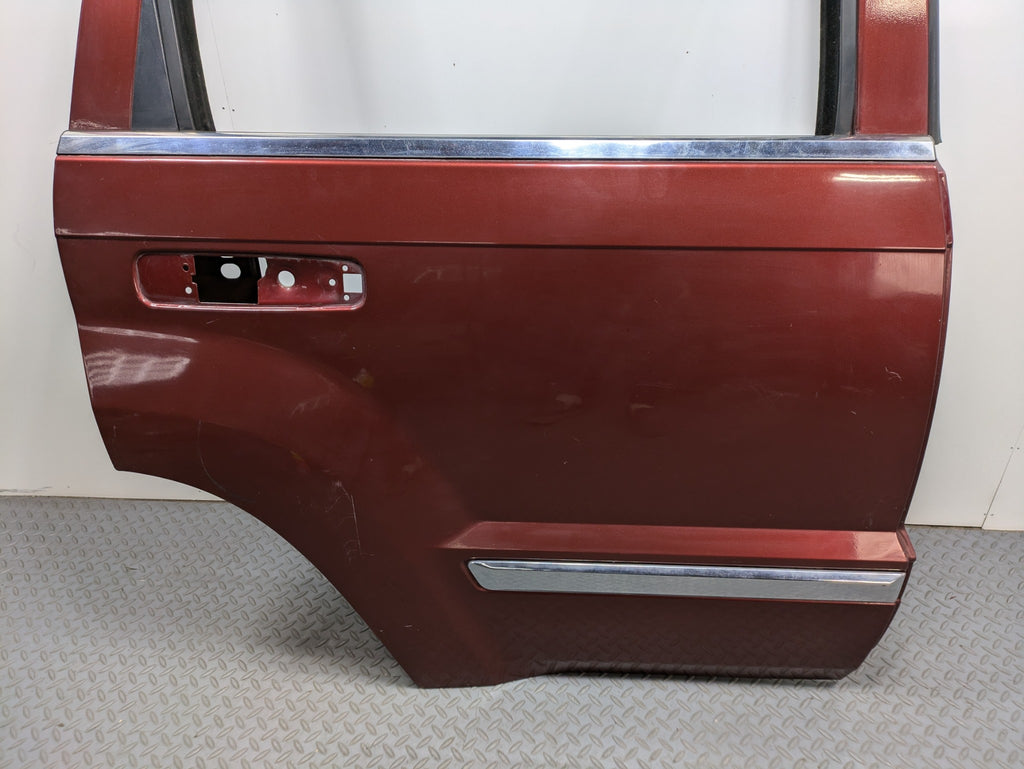 05 - 07 OEM JEEP GRAND CHEROKEE REAR RIGHT SIDE DOOR SHELL PANEL CALIENTE RED