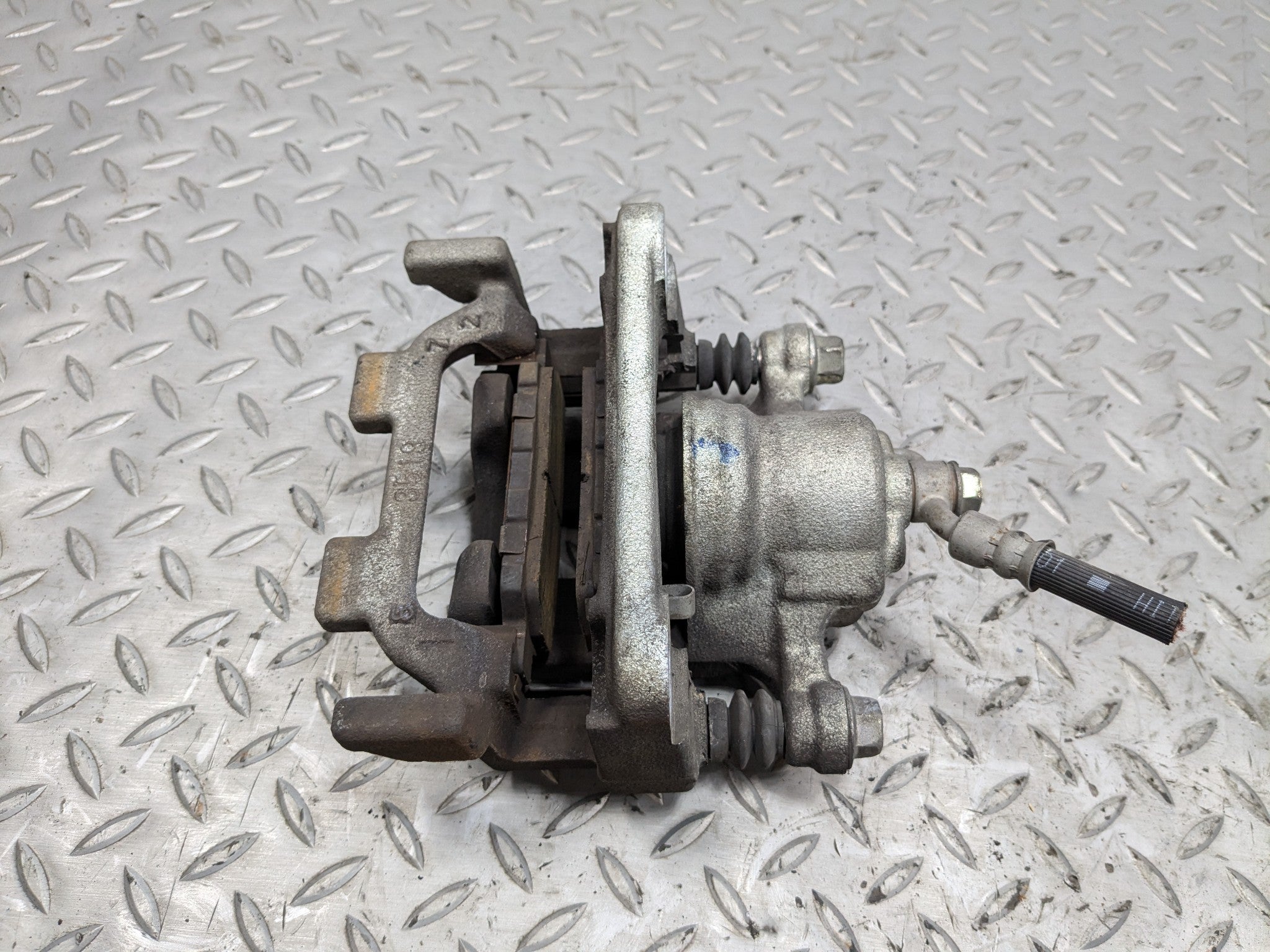2009 - 2011 OEM NISSAN MAXIMA REAR LEFT DRIVER SIDE BRAKE CALIPER ASSEMBLY