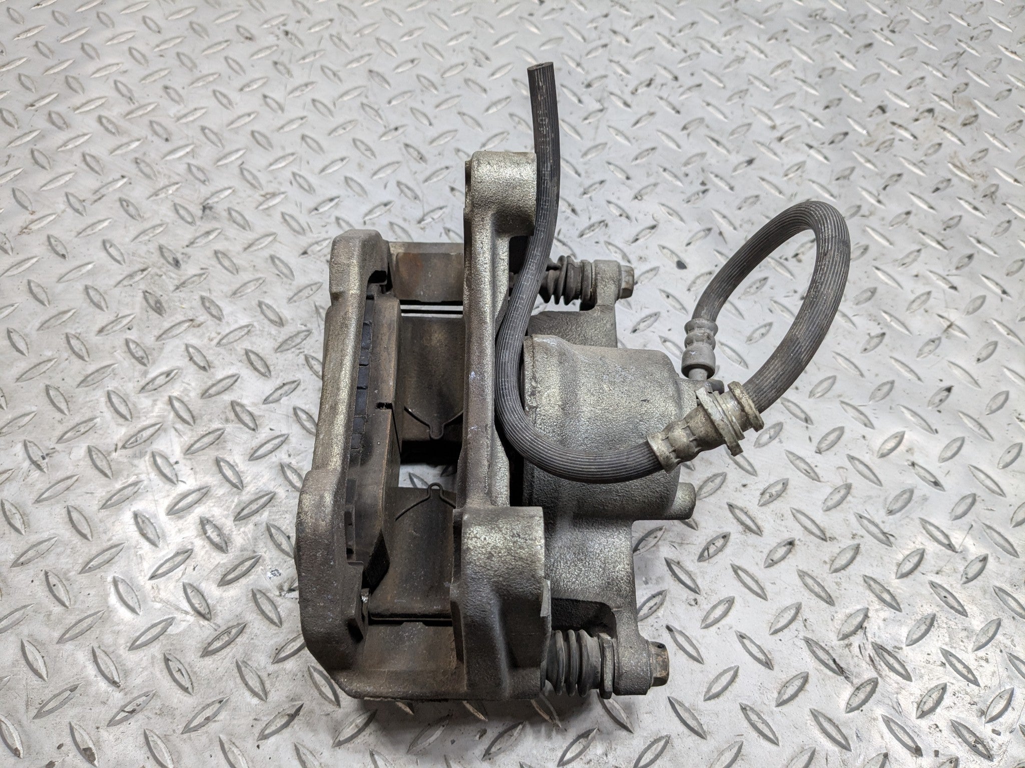 2009 - 2011 OEM NISSAN MAXIMA FRONT LEFT DRIVER SIDE BRAKE CALIPER ASSEMBLY