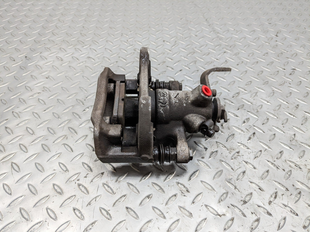 2010 - 2013 OEM MINI COOPER REAR LEFT DRIVER SIDE BASE BRAKE CALIPER ASSEMBLY