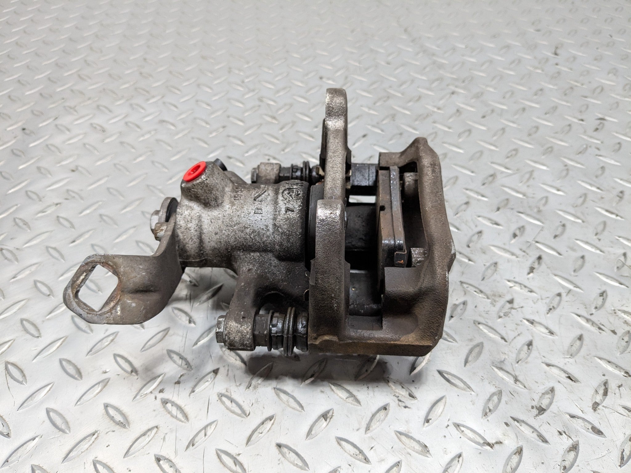 2010 - 2013 OEM MINI COOPER REAR LEFT DRIVER SIDE BASE BRAKE CALIPER ASSEMBLY