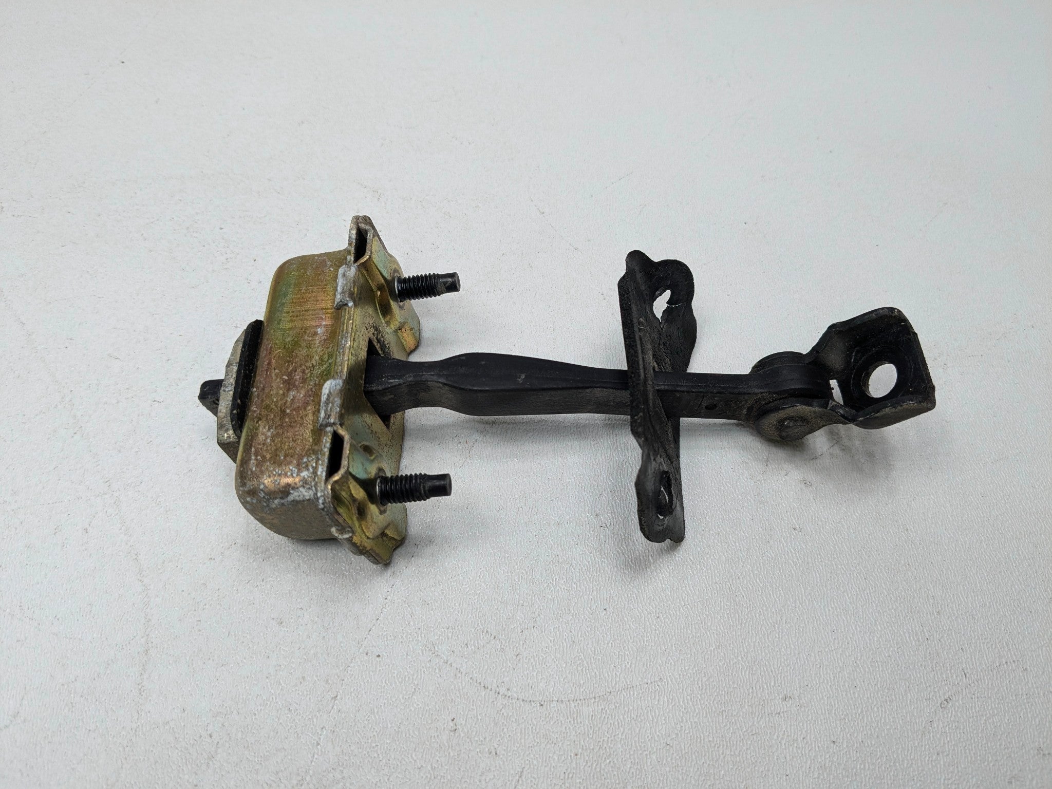 2005 - 2007 OEM CADILLAC CTS REAR RIGHT PASSENGER SIDE DOOR CHECK STRAP STOPPER
