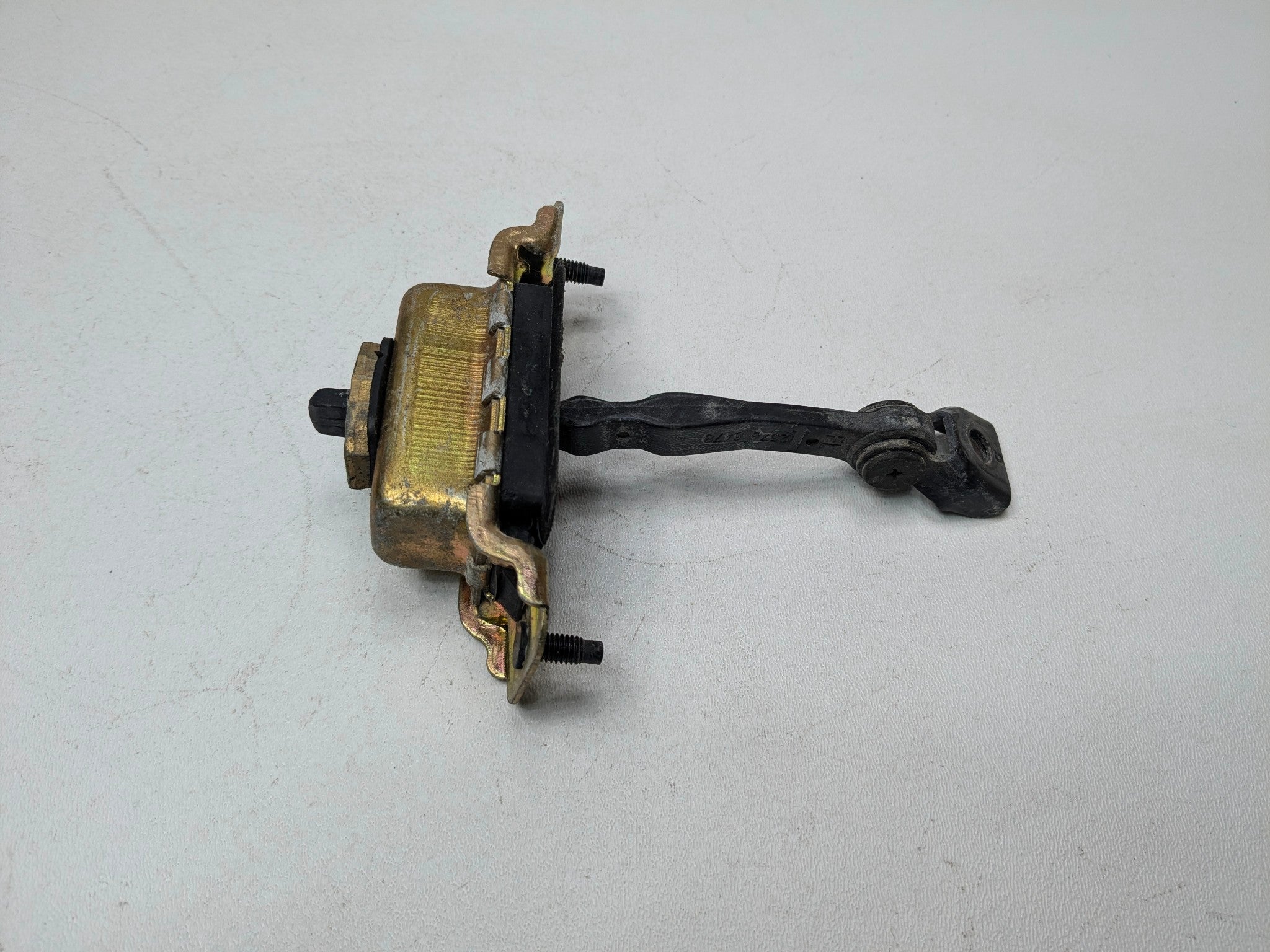 2005 - 2007 OEM CADILLAC CTS FRONT RIGHT PASSENGER SIDE DOOR CHECK STRAP STOPPER
