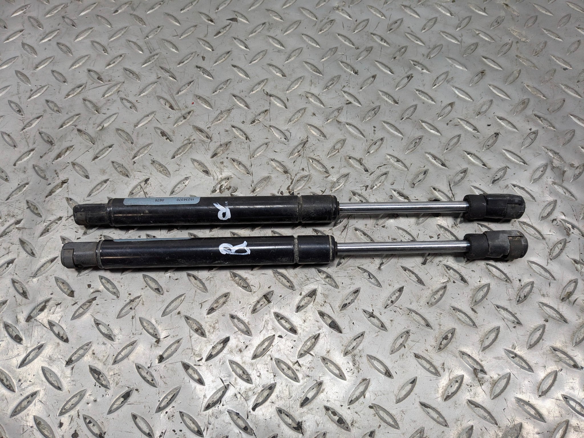 2005 - 2007 OEM CADILLAC CTS FRONT LEFT AND RIGHT SIDE HOOD SUPPORT SHOCK STRUT