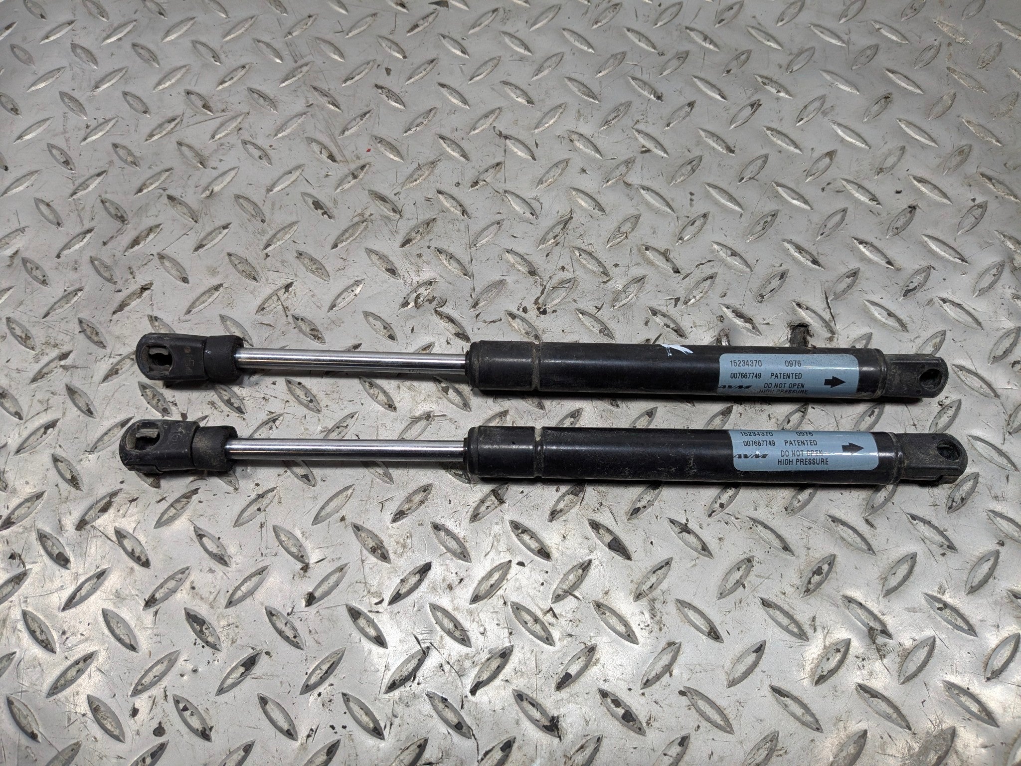 2005 - 2007 OEM CADILLAC CTS FRONT LEFT AND RIGHT SIDE HOOD SUPPORT SHOCK STRUT