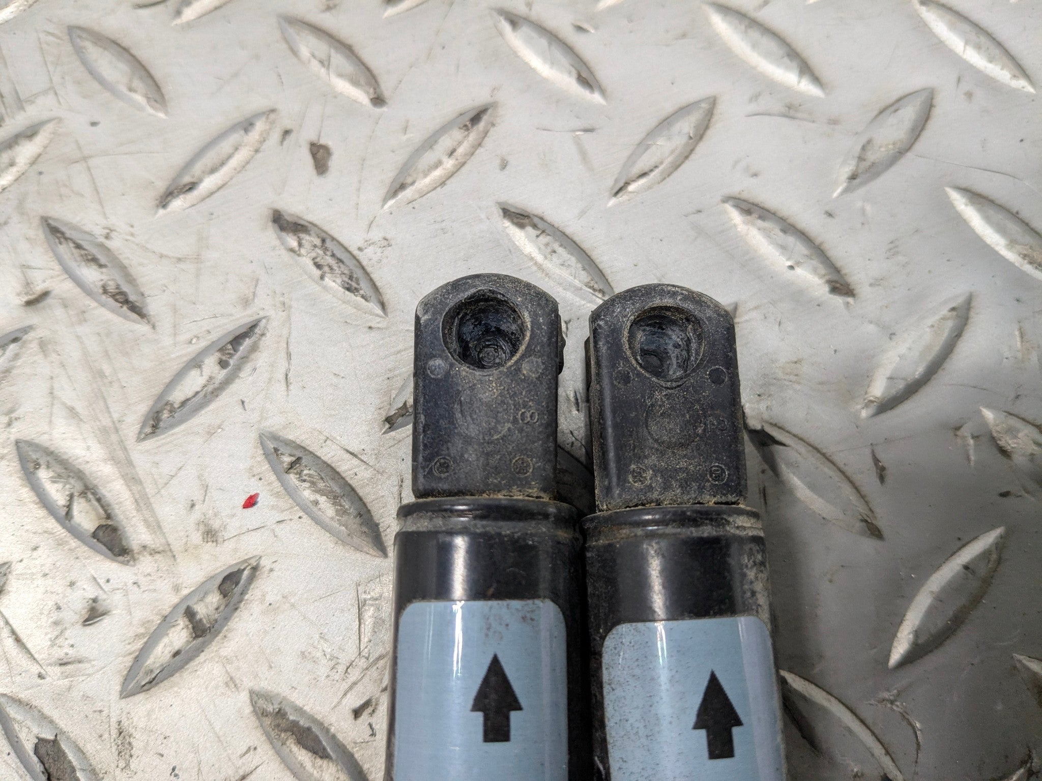 2005 - 2007 OEM CADILLAC CTS FRONT LEFT AND RIGHT SIDE HOOD SUPPORT SHOCK STRUT