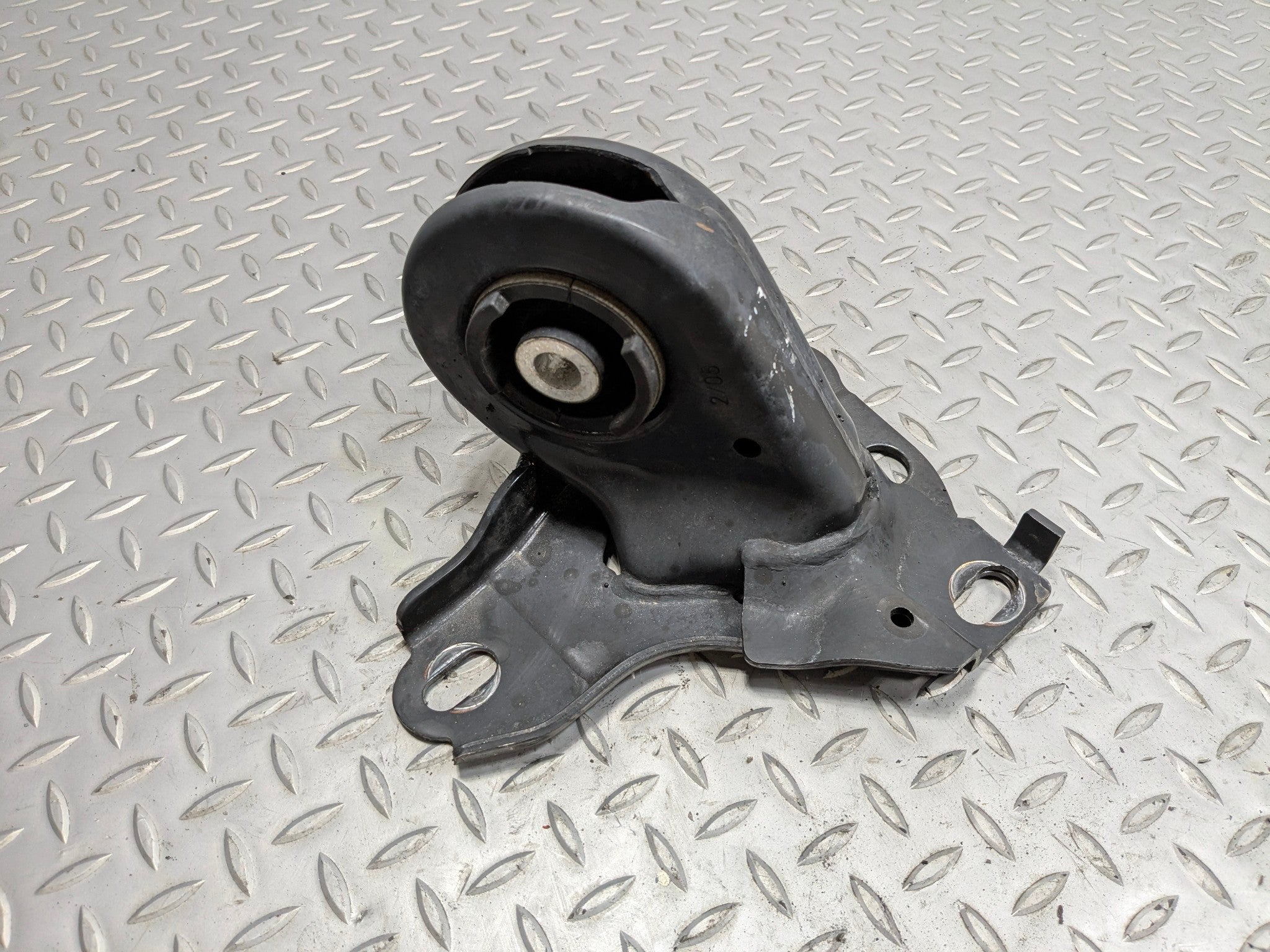 2008 - 2014 MINI COOPER OEM LOWER TRAILING ARM BRACKET BUSHING REAR LEFT SIDE