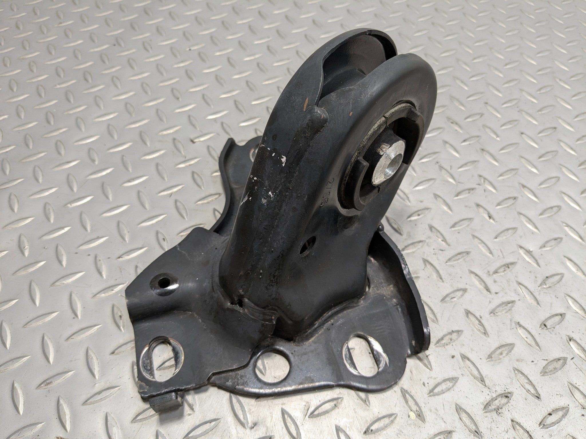 2008 - 2014 MINI COOPER OEM LOWER TRAILING ARM BRACKET BUSHING REAR LEFT SIDE