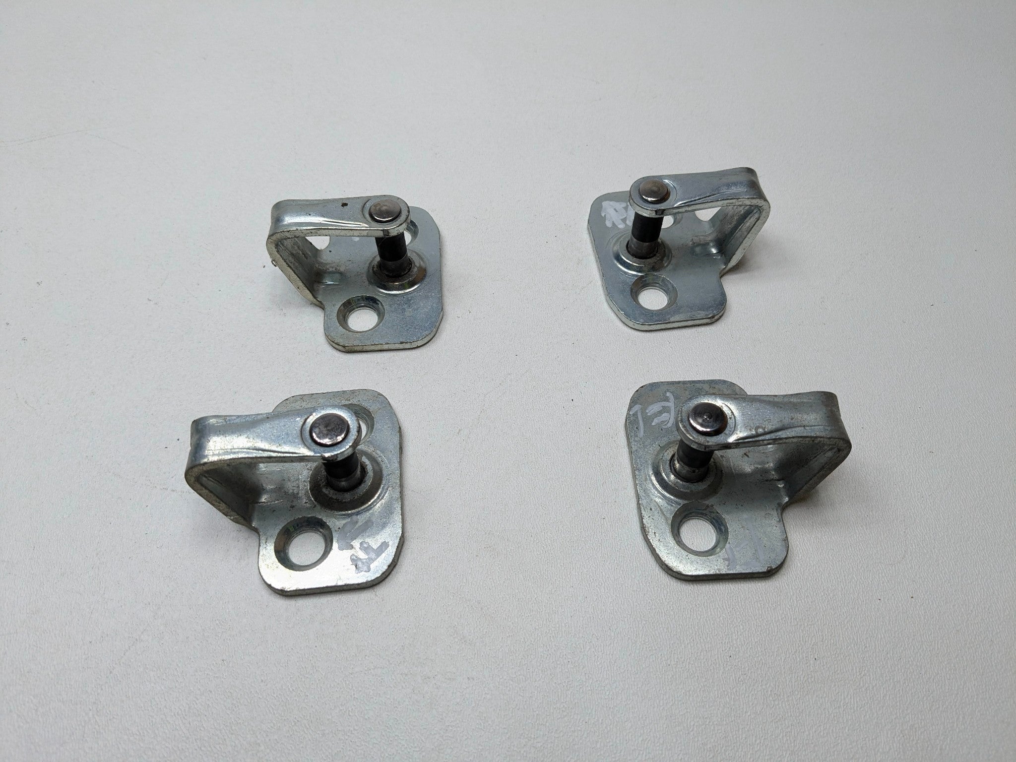 2005 - 2007 CADILLAC CTS OEM DOOR LOCK STRIKER SET FRONT AND REAR SIDE