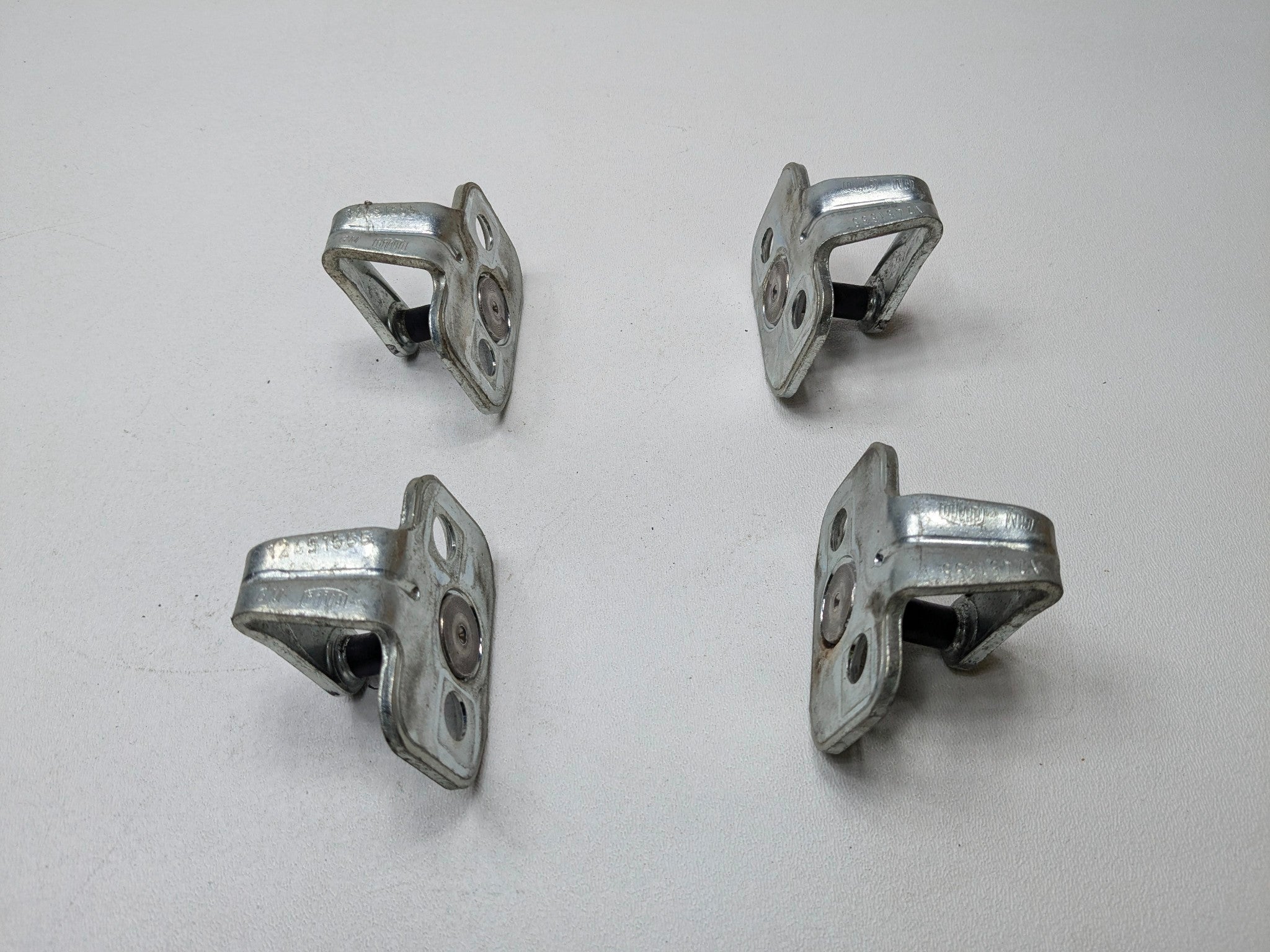 2005 - 2007 CADILLAC CTS OEM DOOR LOCK STRIKER SET FRONT AND REAR SIDE