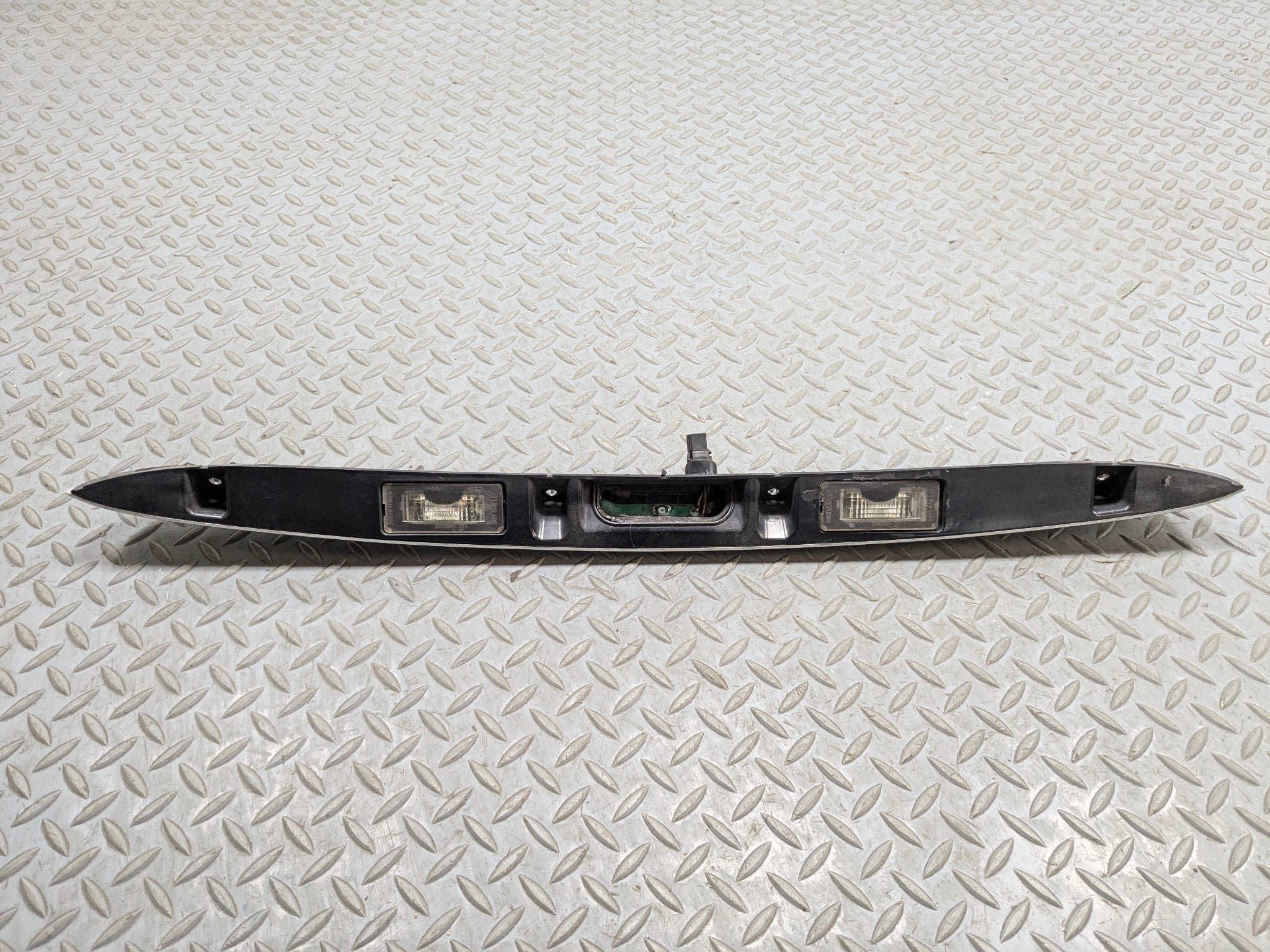 2007 - 2010 MINI COOPER OEM REAR TRUNK LID HANDLE TRIM MOLDING WITH LIGHT CHROME