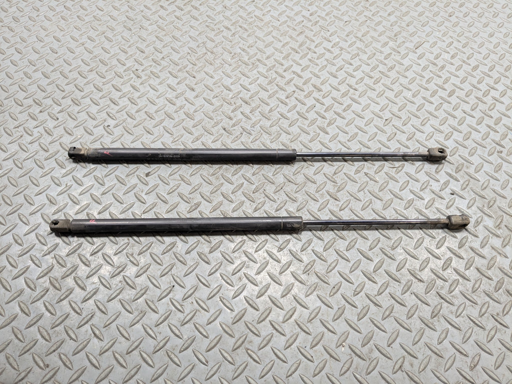 10 - 15 LINCOLN MKT OEM HOOD SHOCK STRUT SET OF TWO FRONT LEFT AND RIGHT SIDE