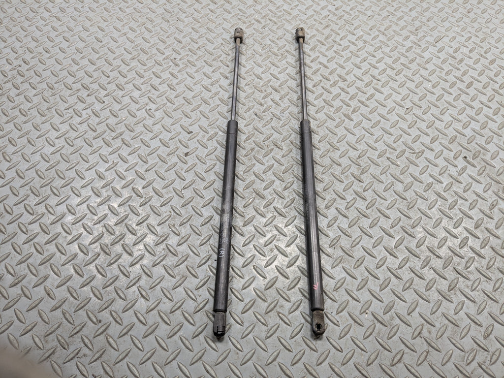 10 - 15 LINCOLN MKT OEM HOOD SHOCK STRUT SET OF TWO FRONT LEFT AND RIGHT SIDE