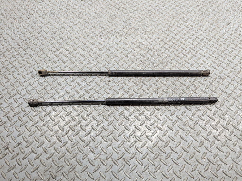 10 - 15 LINCOLN MKT OEM HOOD SHOCK STRUT SET OF TWO FRONT LEFT AND RIGHT SIDE