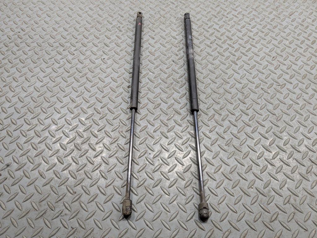 10 - 15 LINCOLN MKT OEM HOOD SHOCK STRUT SET OF TWO FRONT LEFT AND RIGHT SIDE