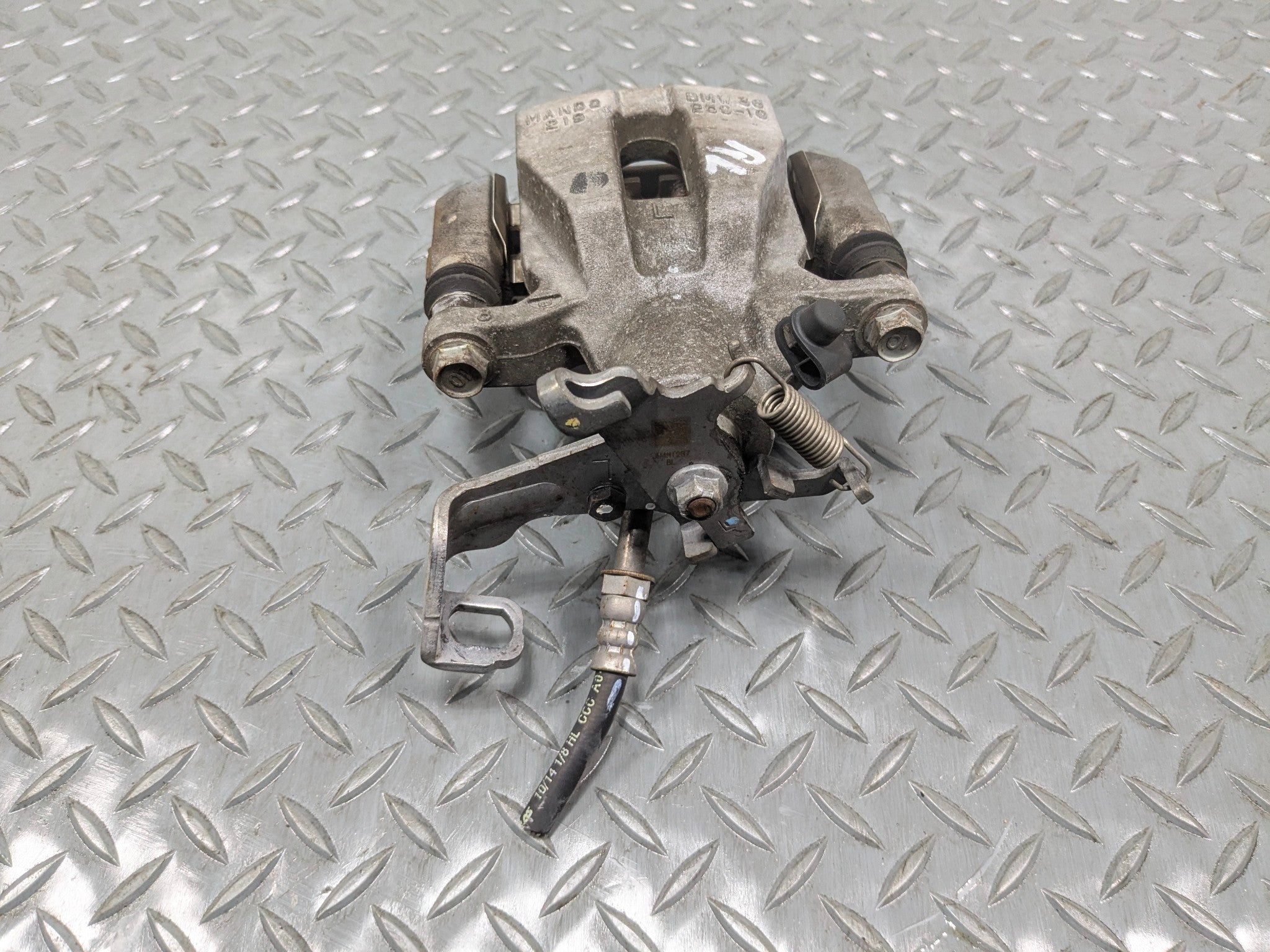 2013 - 2017 MINI COOPER OEM BRAKE CALIPER ASSEMBLY REAR LEFT DRIVER SIDE