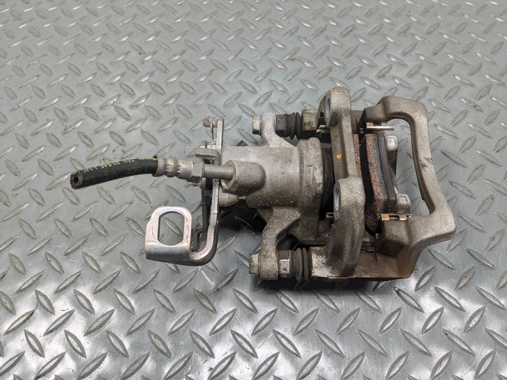 2013 - 2017 MINI COOPER OEM BRAKE CALIPER ASSEMBLY REAR LEFT DRIVER SIDE