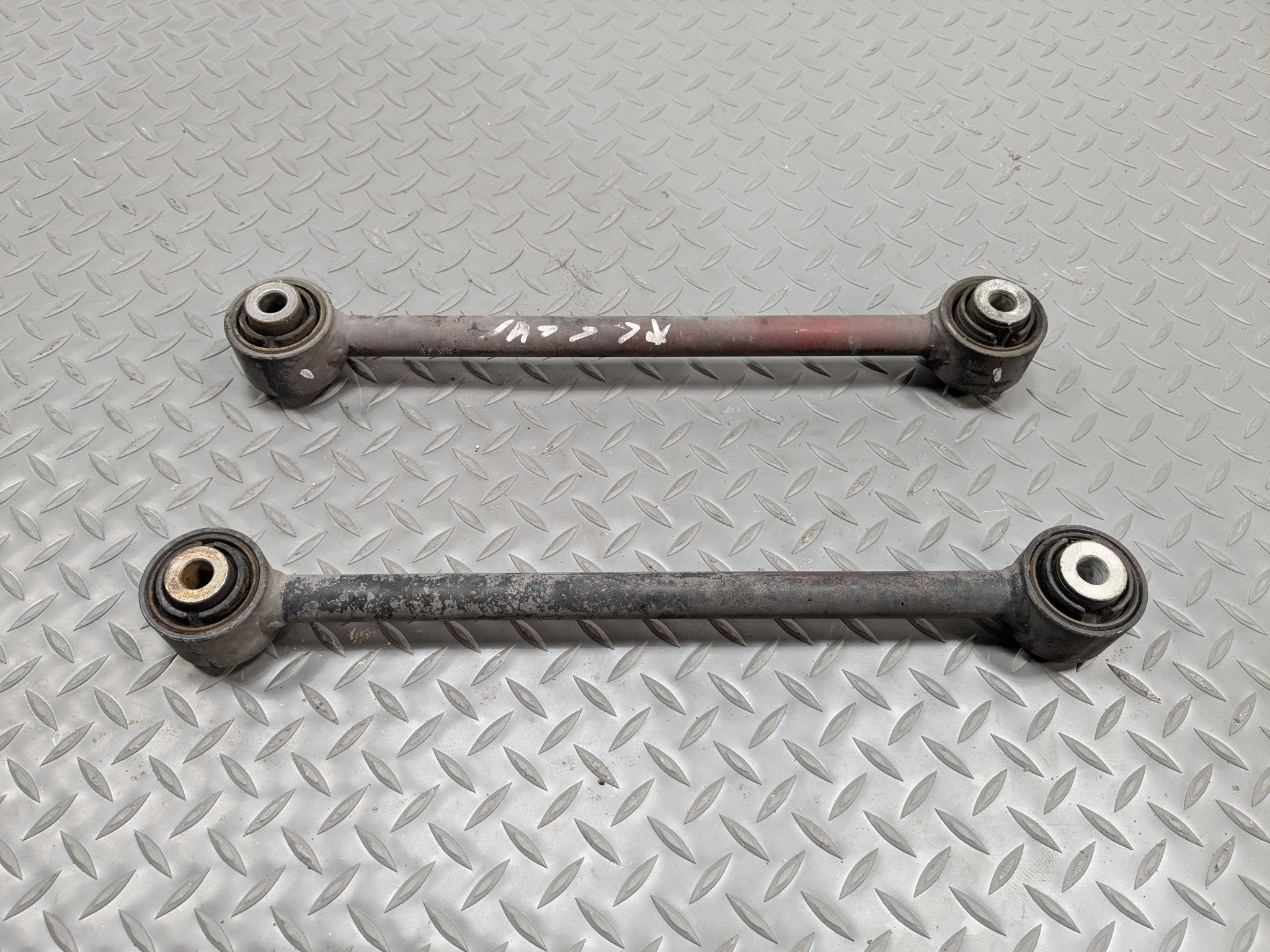 2004 - 2008 ACURA TSX OEM LOWER CONTROL ARM AND LINK ROD REAR LEFT DRIVER SIDE