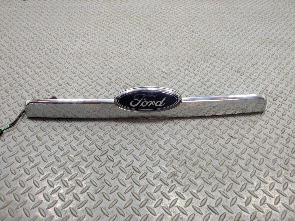 2006 - 2010 FORD EXPLORER OEM REAR TRUNK LID LICENSE PLATE BODY MOLDING TRIM