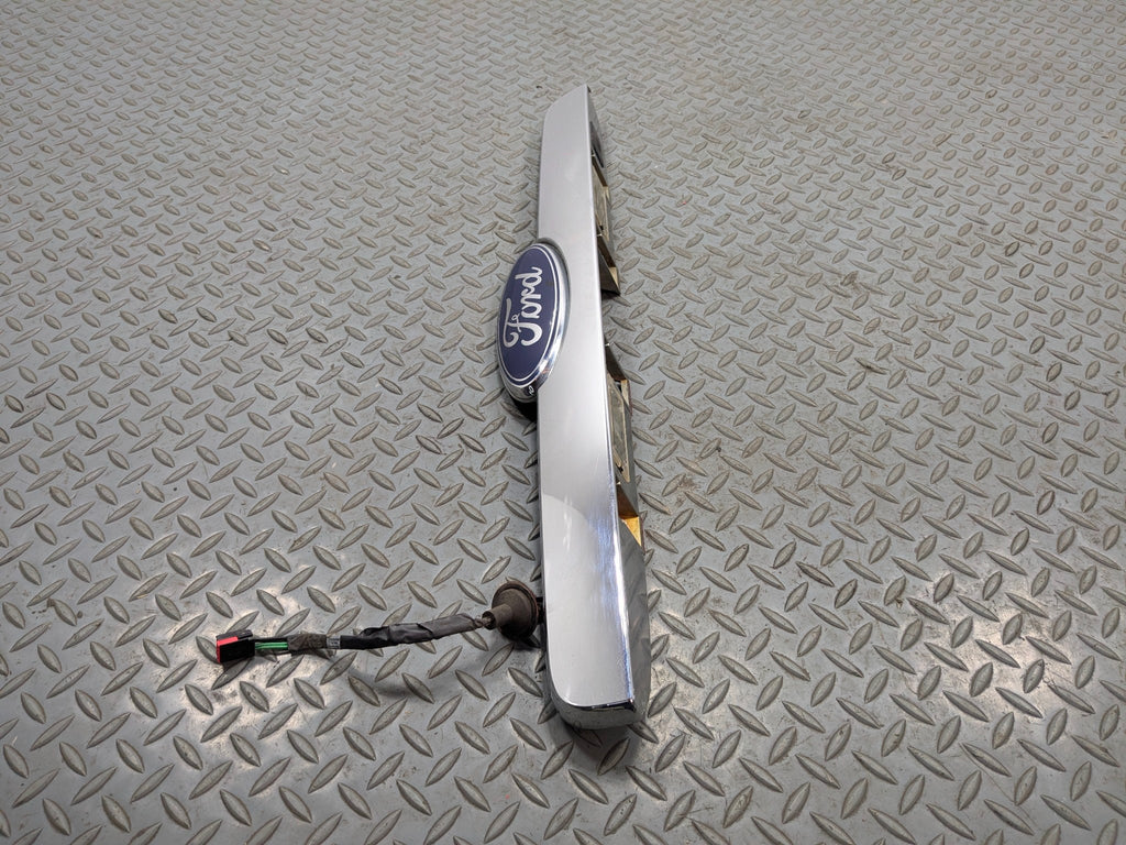 2006 - 2010 FORD EXPLORER OEM REAR TRUNK LID LICENSE PLATE BODY MOLDING TRIM