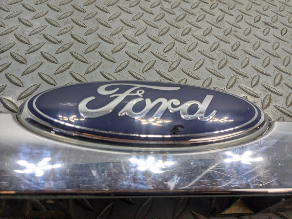 2006 - 2010 FORD EXPLORER OEM REAR TRUNK LID LICENSE PLATE BODY MOLDING TRIM