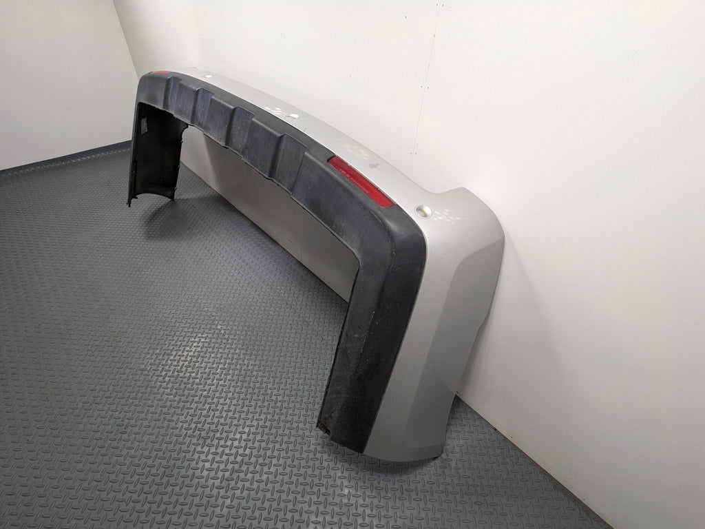 2003 - 2005 LAND ROVER RANGE ROVER OEM REAR BUMPER COVER PANEL WITH PARK ASSIST