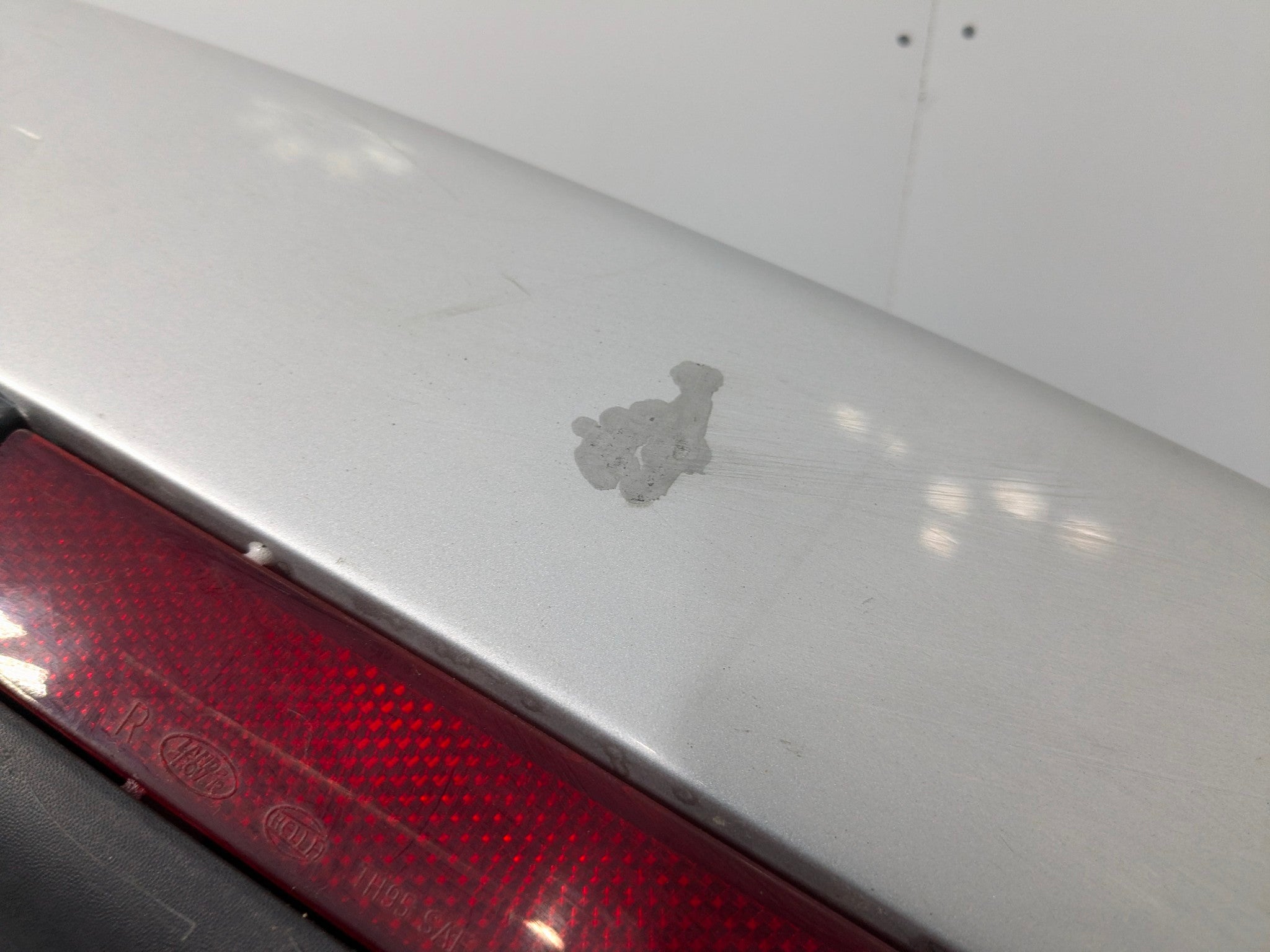 2003 - 2005 LAND ROVER RANGE ROVER OEM REAR BUMPER COVER PANEL WITH PARK ASSIST