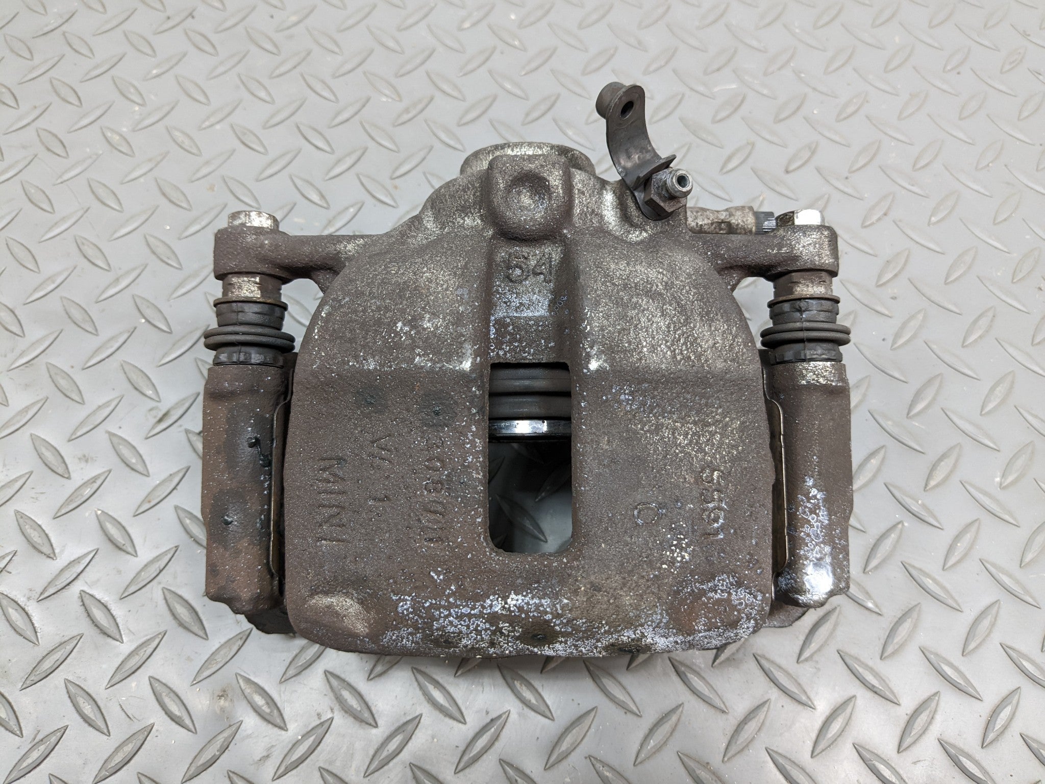 2011 - 2014 MINI COOPER CLUBMAN OEM BRAKE CALIPER BASE FRONT LEFT DRIVER SIDE