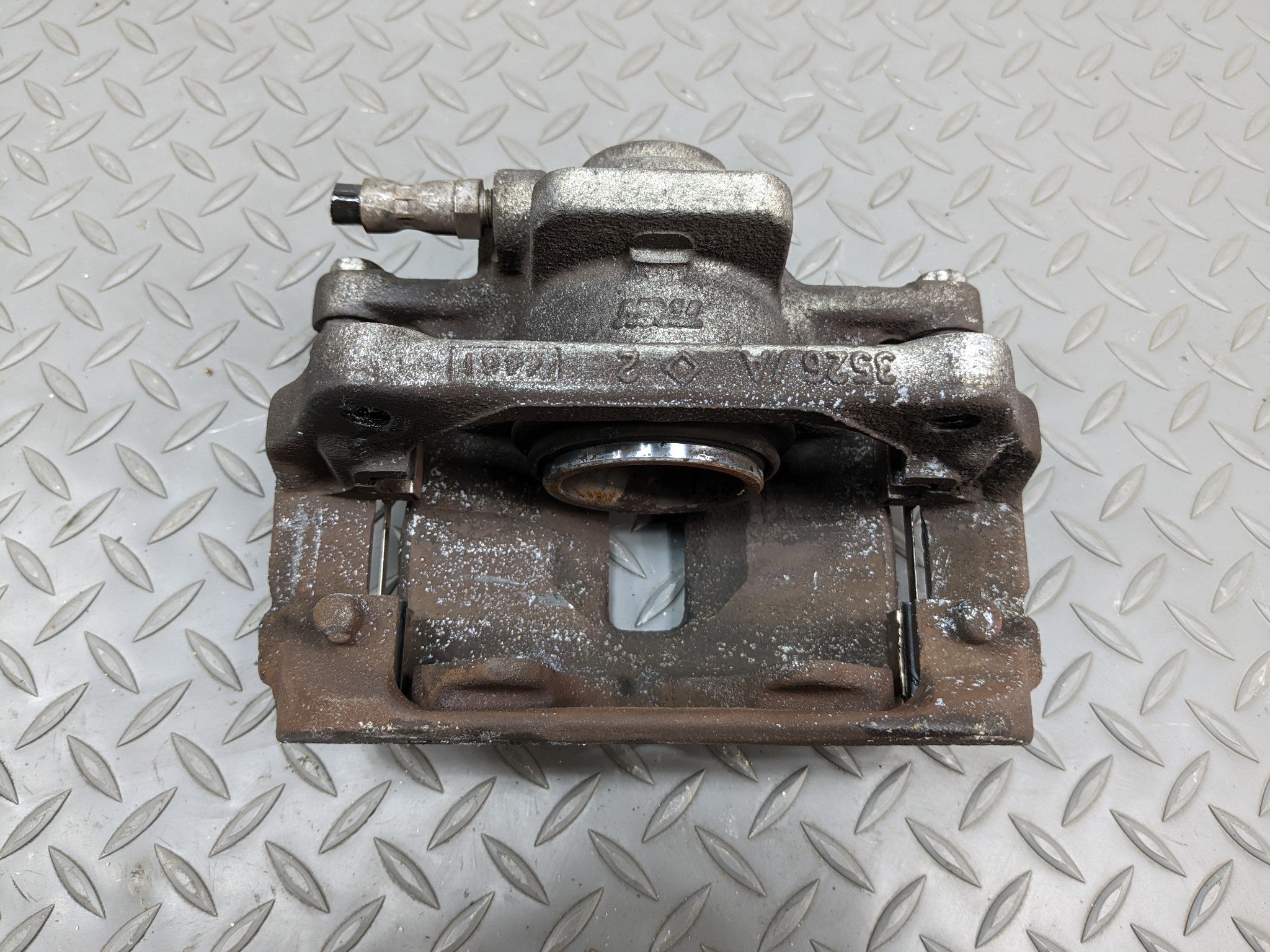 2011 - 2014 MINI COOPER CLUBMAN OEM BRAKE CALIPER BASE FRONT LEFT DRIVER SIDE