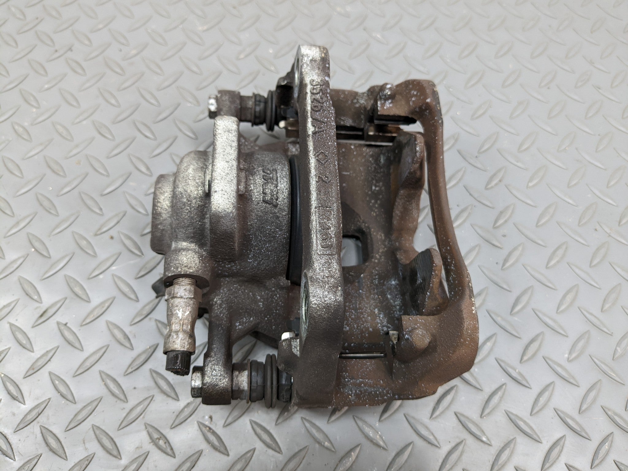 2011 - 2014 MINI COOPER CLUBMAN OEM BRAKE CALIPER BASE FRONT LEFT DRIVER SIDE