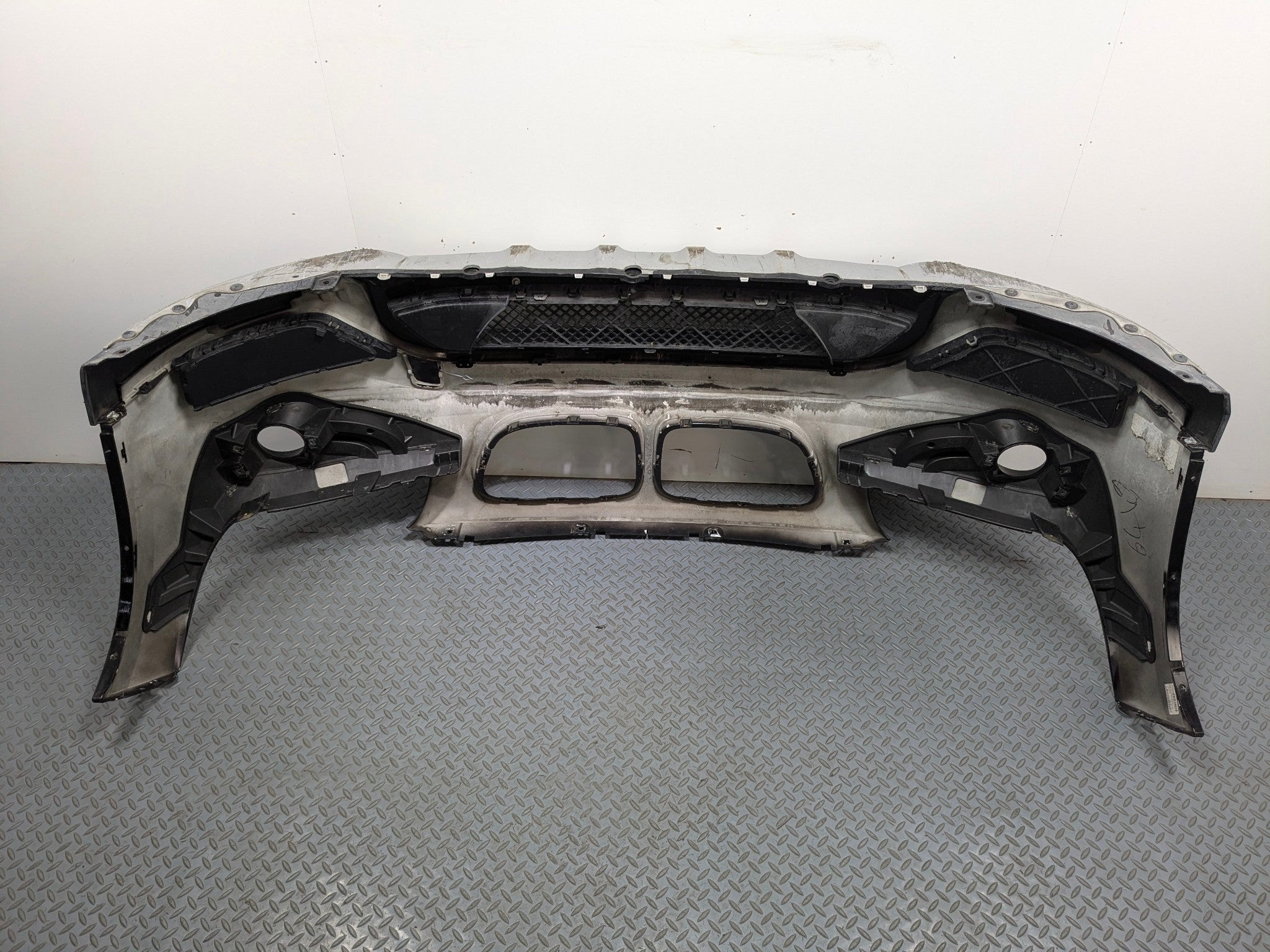 2013 - 2015 BMW X1 OEM FRONT BUMPER COVER PANEL ASSEMBLY BLACK