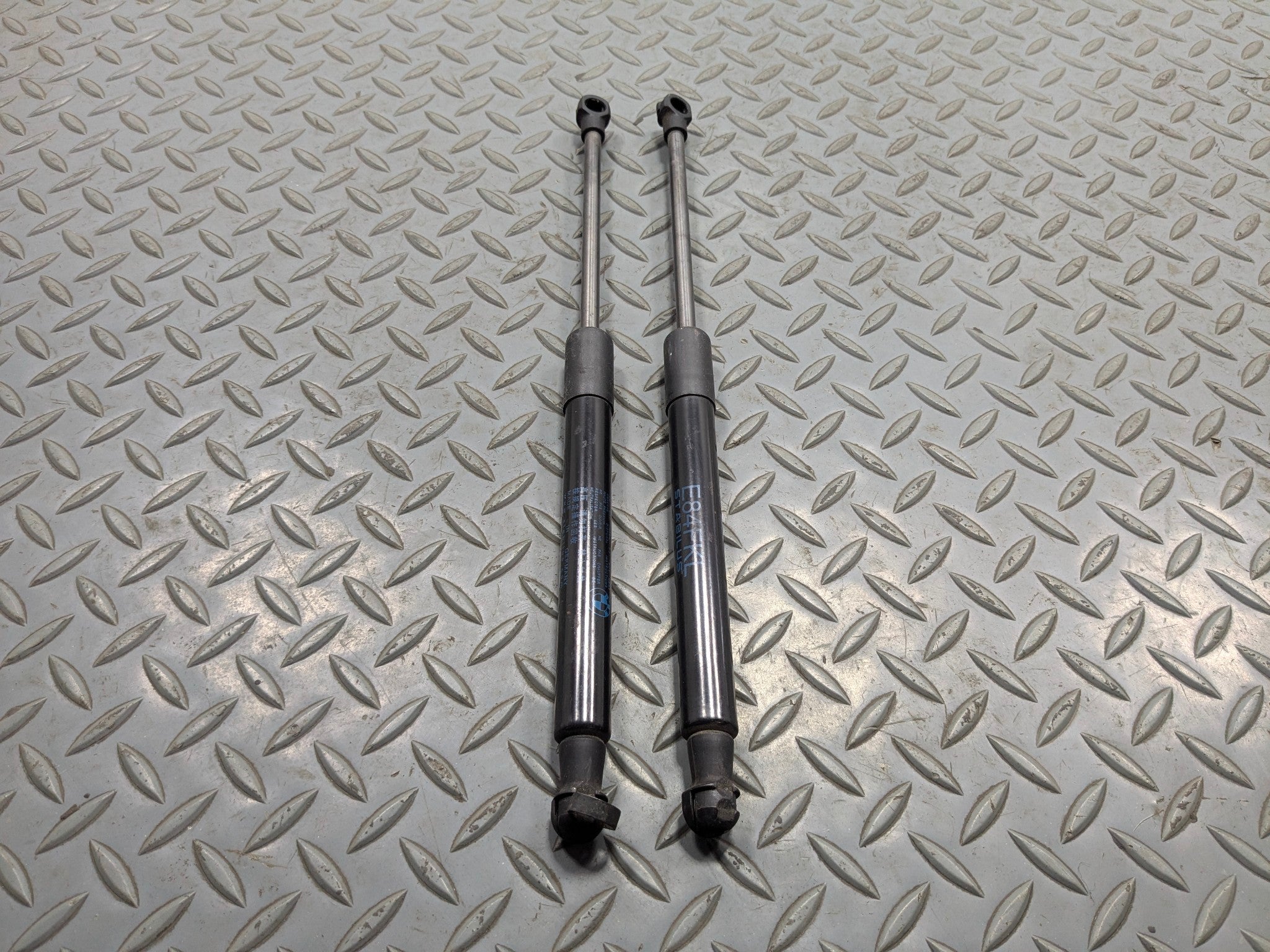 2013 - 2015 BMW X1 OEM FRONT HOOD BONNET SHOCK STRUT LIFT SUPPORT SET OF 2